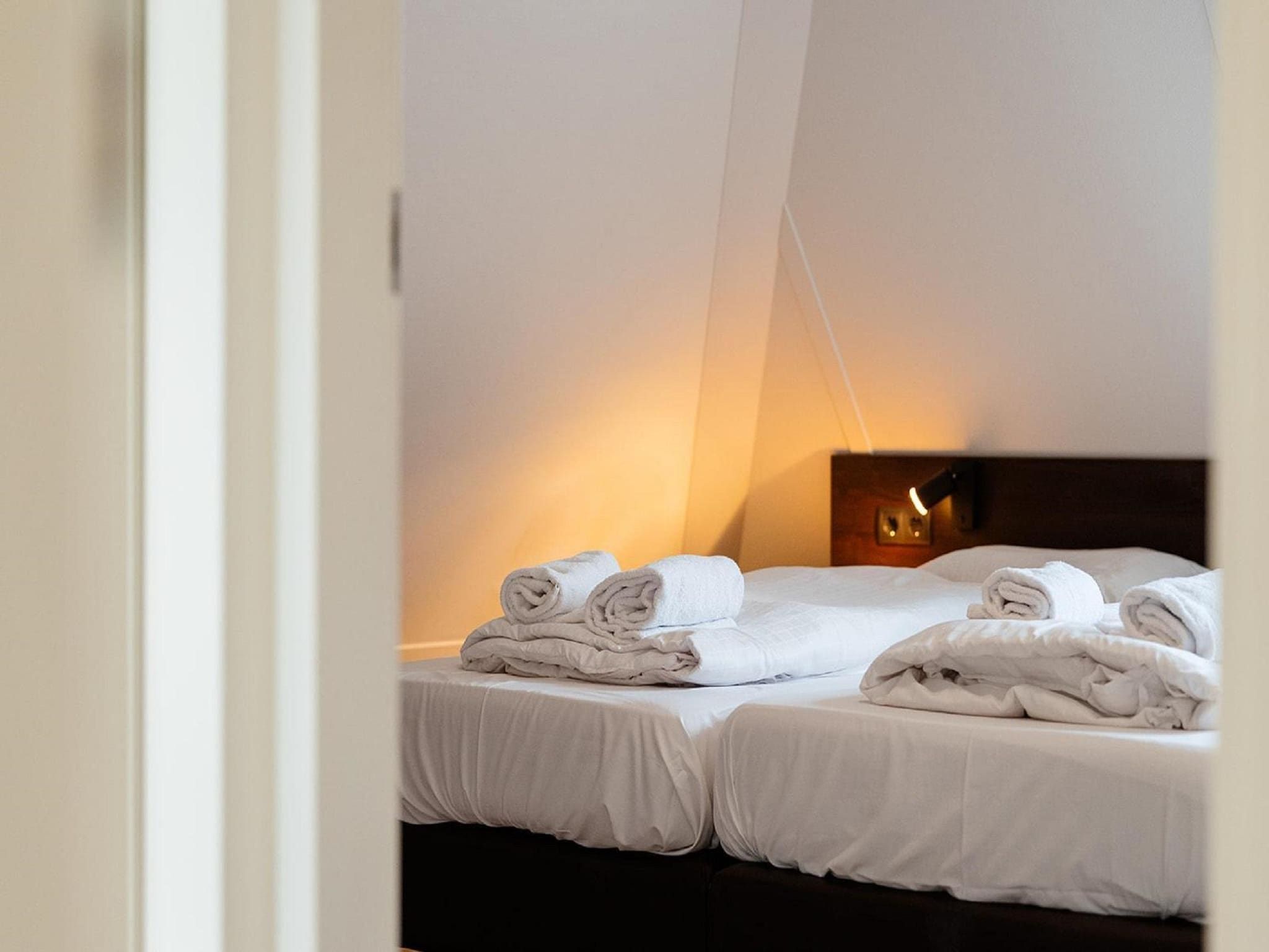 Een slaapkamer van Landgoed De IJsvogel 3 in Voorthuizen