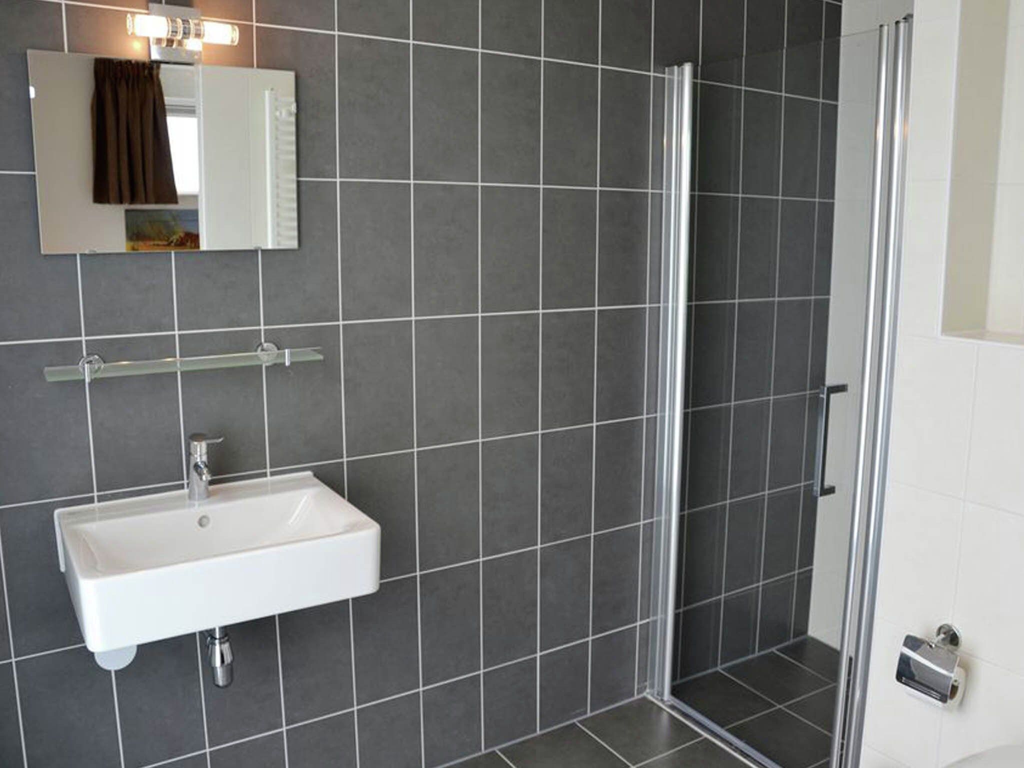 De badkamer van Résidence de Weerribben 1 in Paasloo