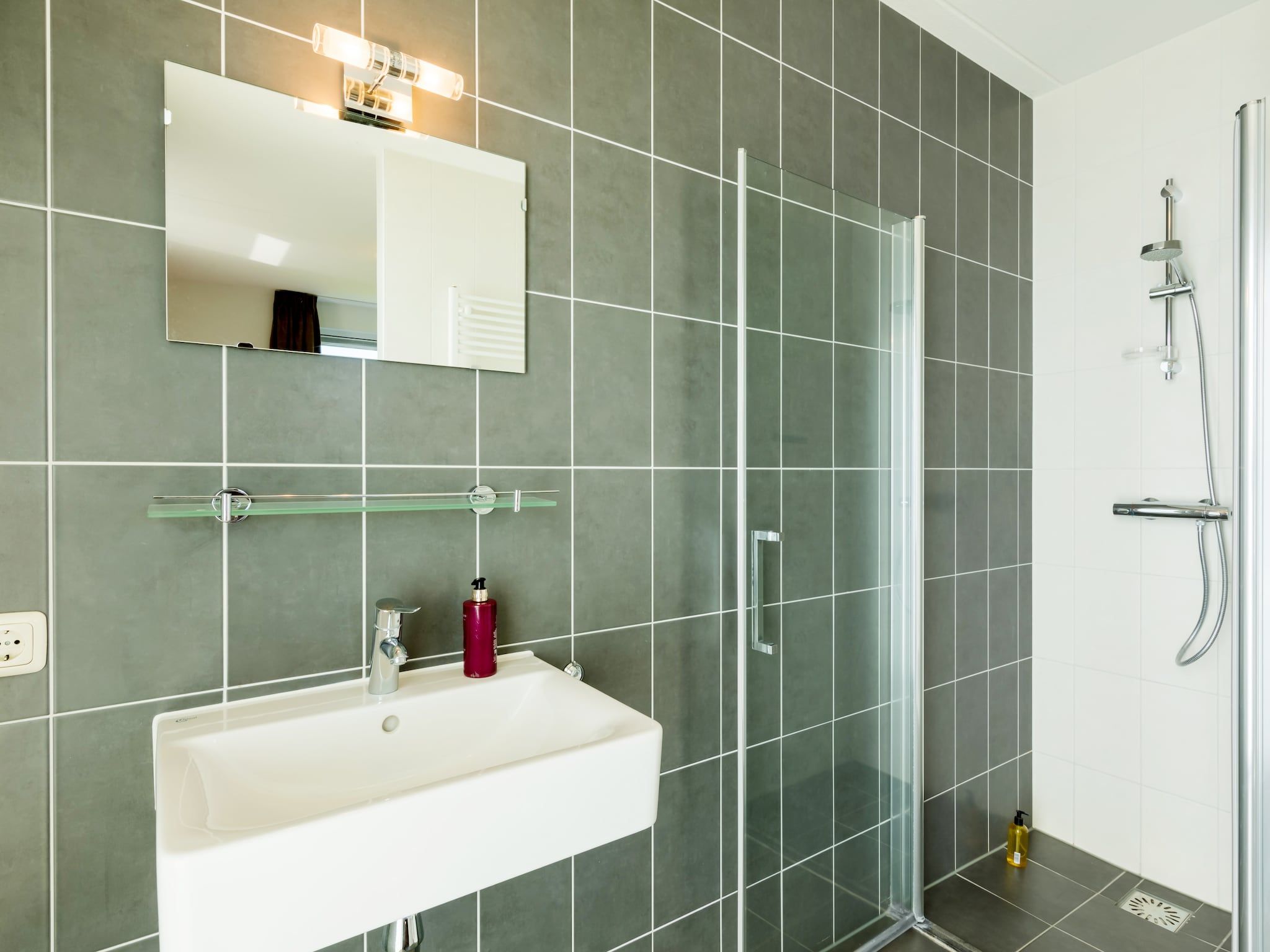 De badkamer van Résidence de Weerribben 2 in Paasloo