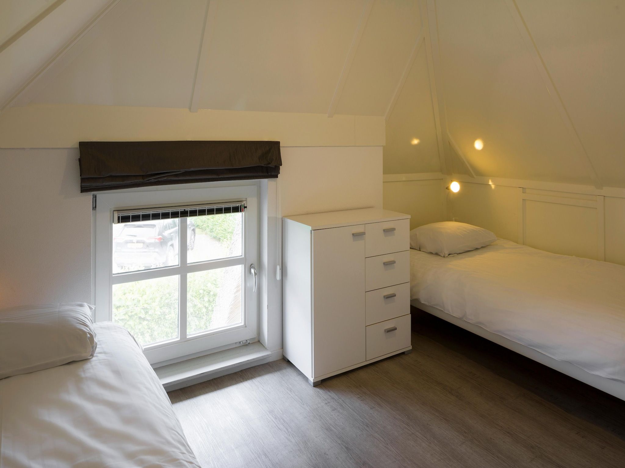 Een slaapkamer van Waterpark Belterwiede 2 in Wanneperveen