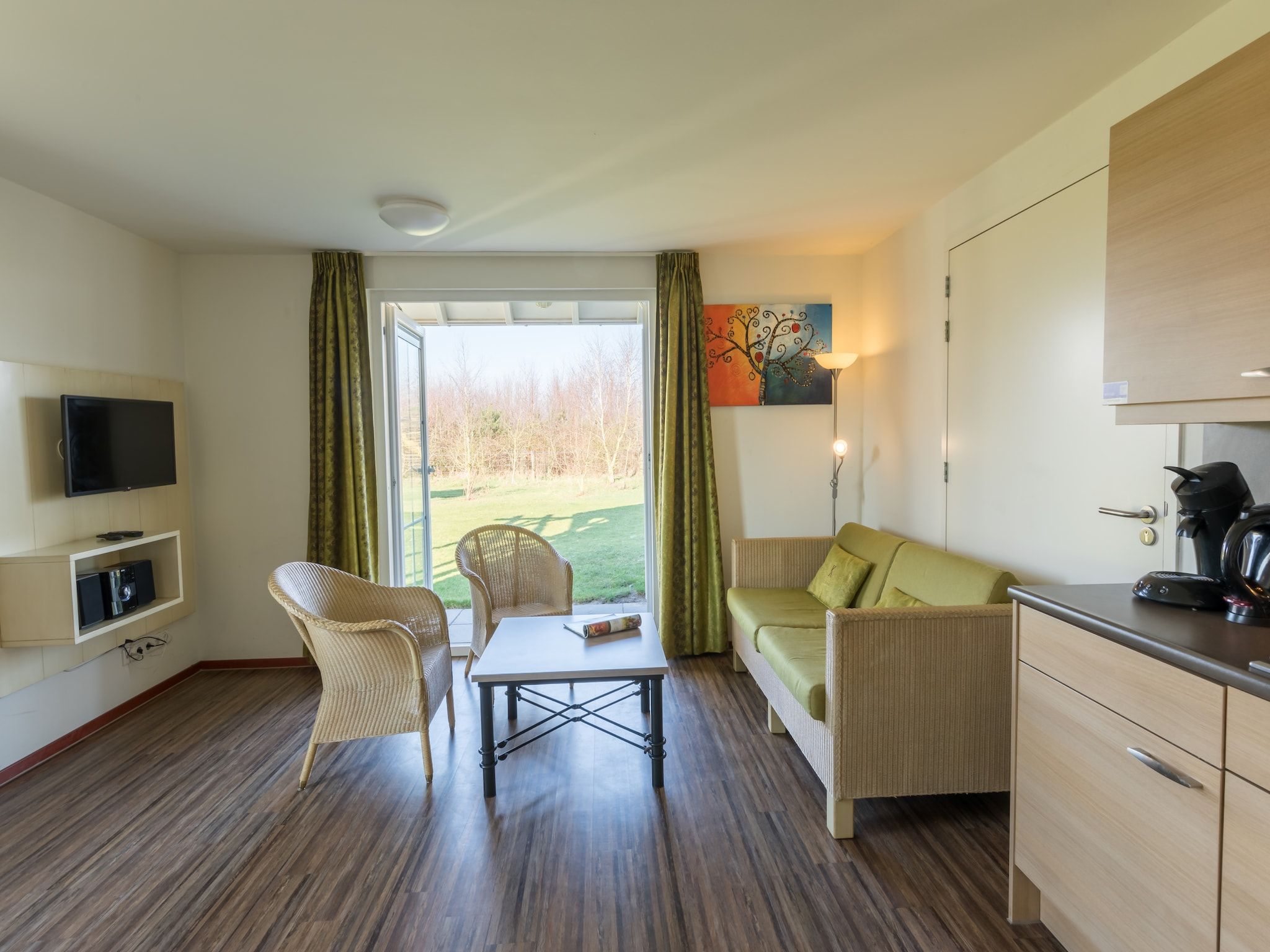 De woonkamer van Résidence Klein Vink 3 in Arcen