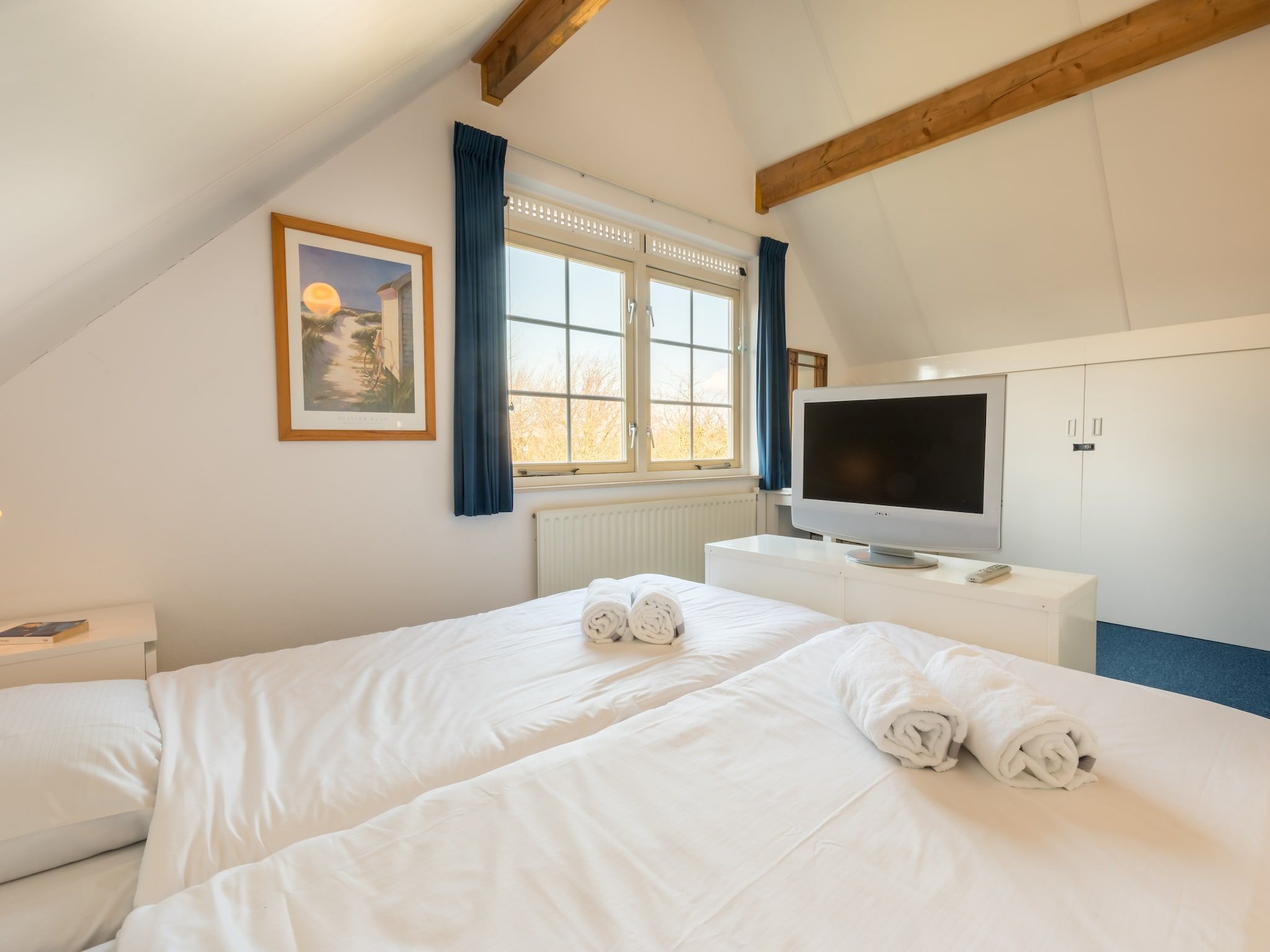 Een slaapkamer van Buitenhof Domburg 10 in Domburg