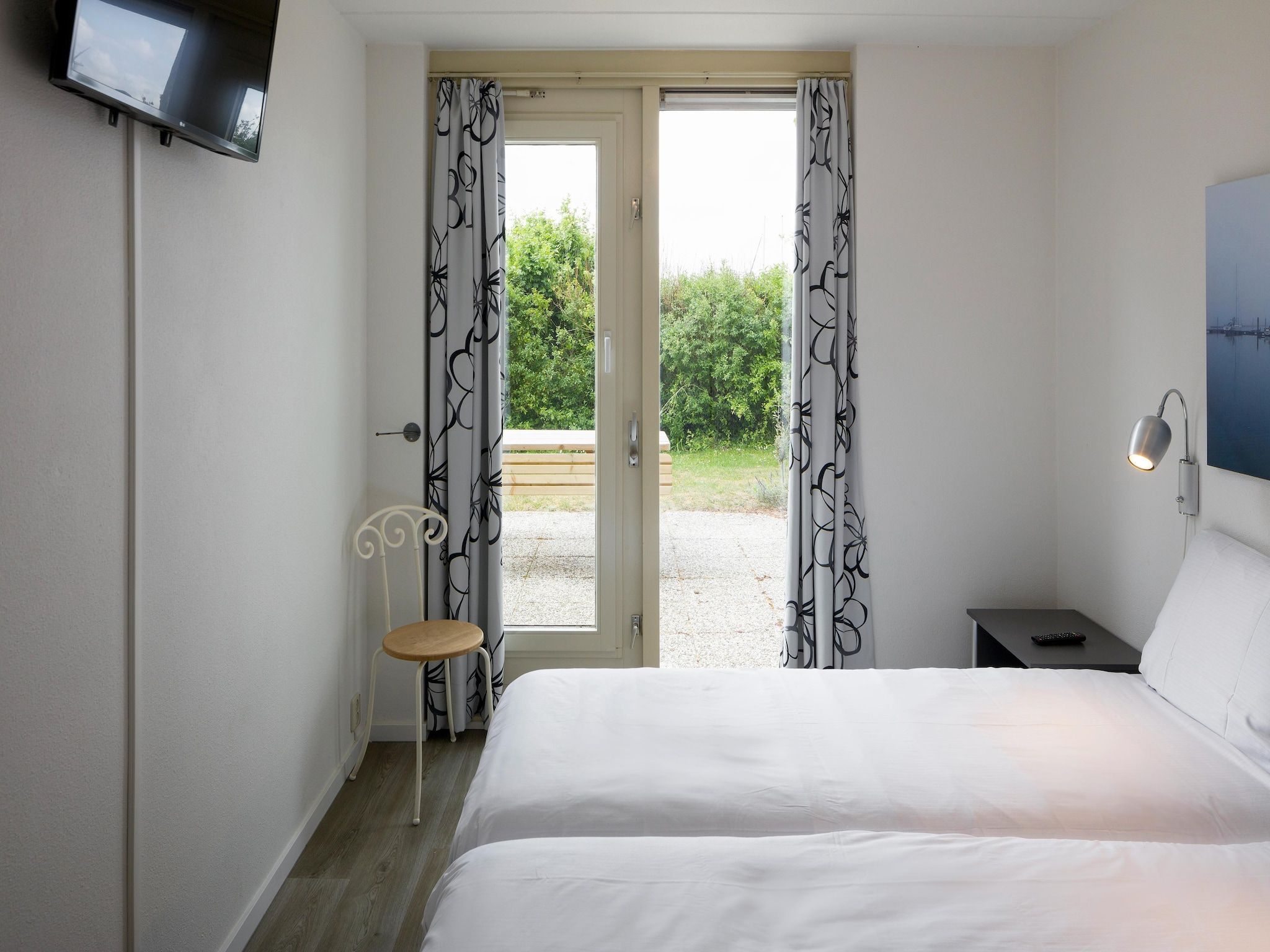 Een slaapkamer van Roompot Beach Resort 20 in Kamperland