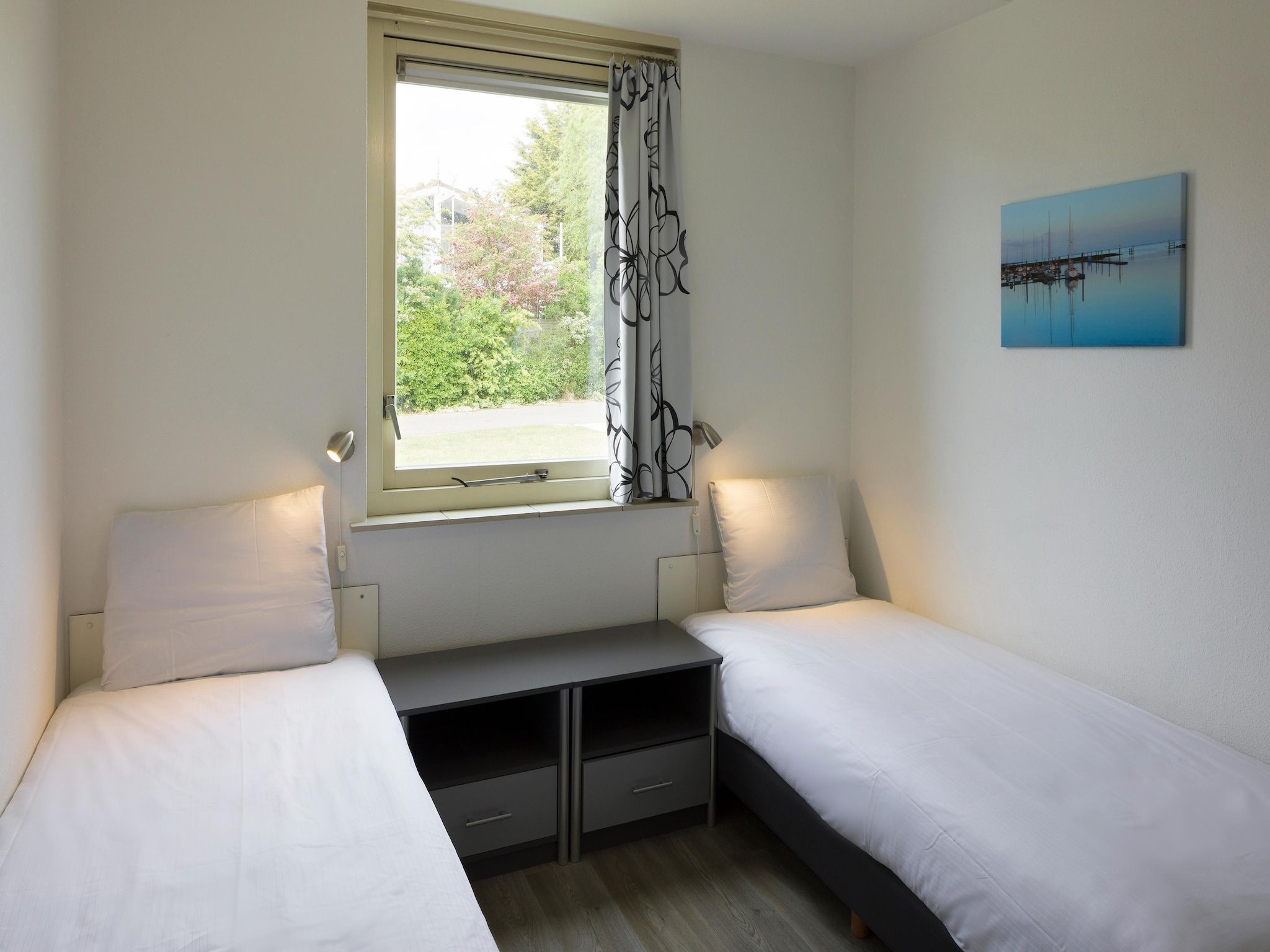 Een slaapkamer van Roompot Beach Resort 20 in Kamperland