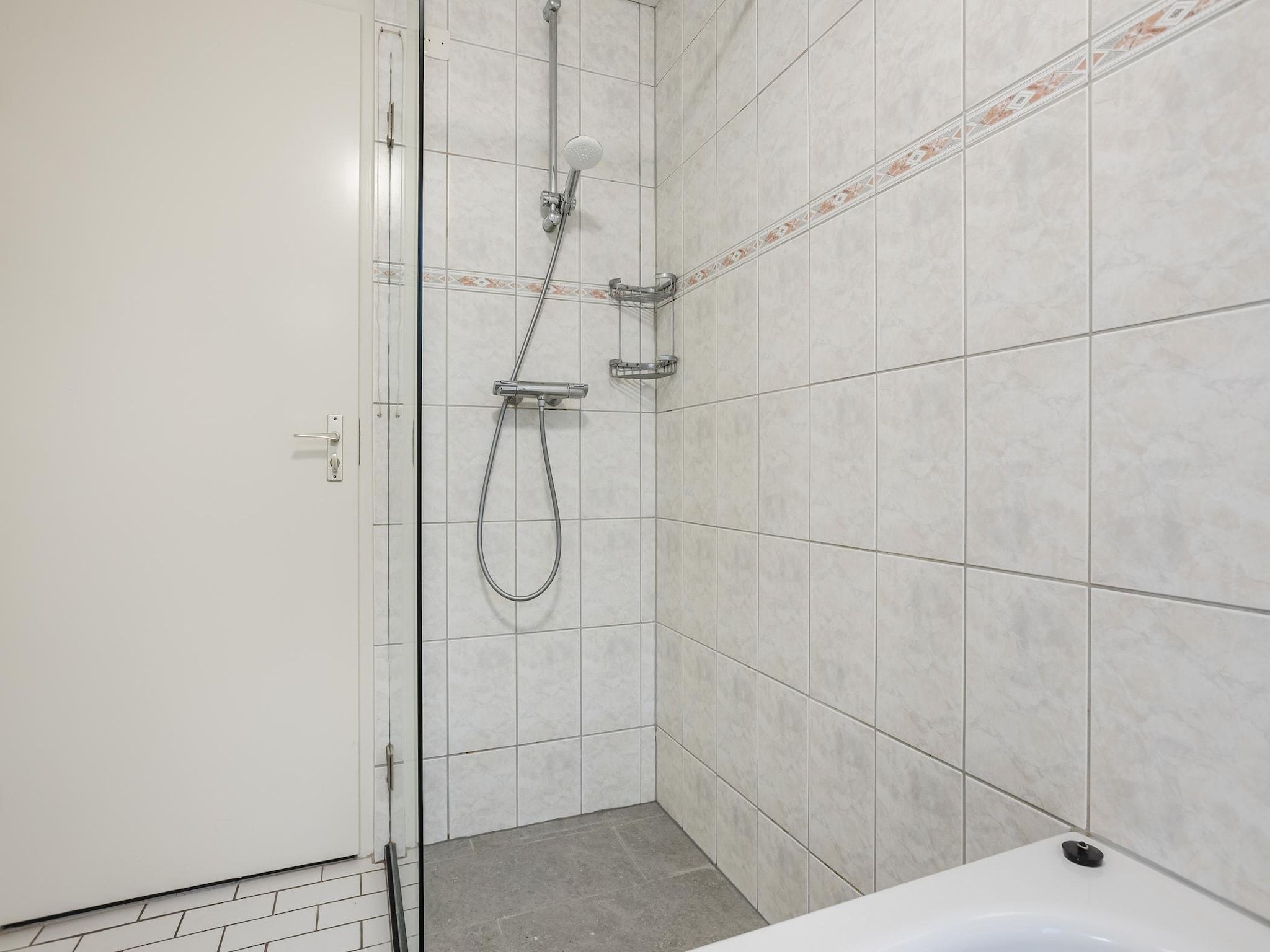 De badkamer van Boomhiemke Duinbungalow 4 in Hollum