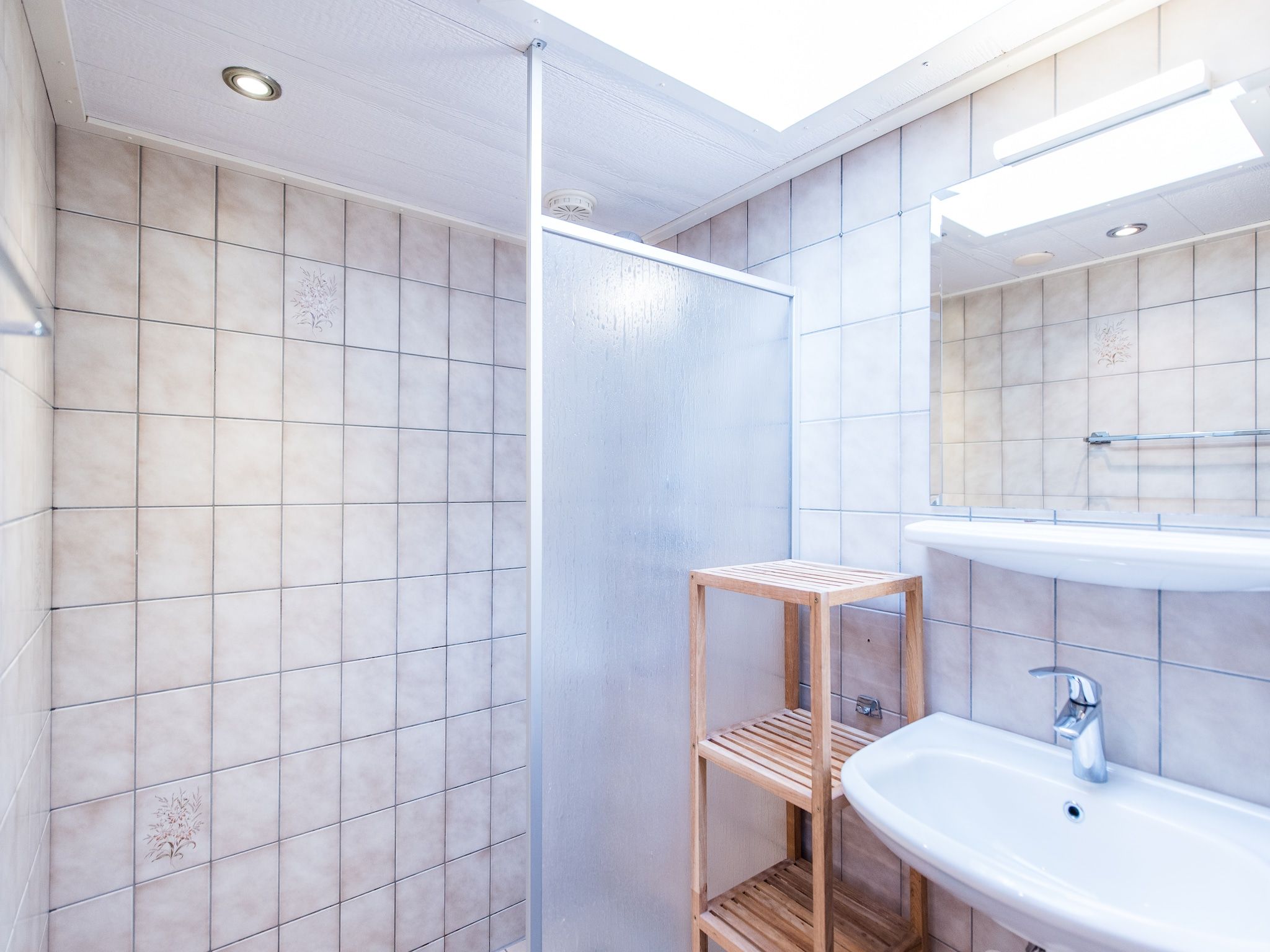 De badkamer van Vakantiepark Boomhiemke 10 in Hollum