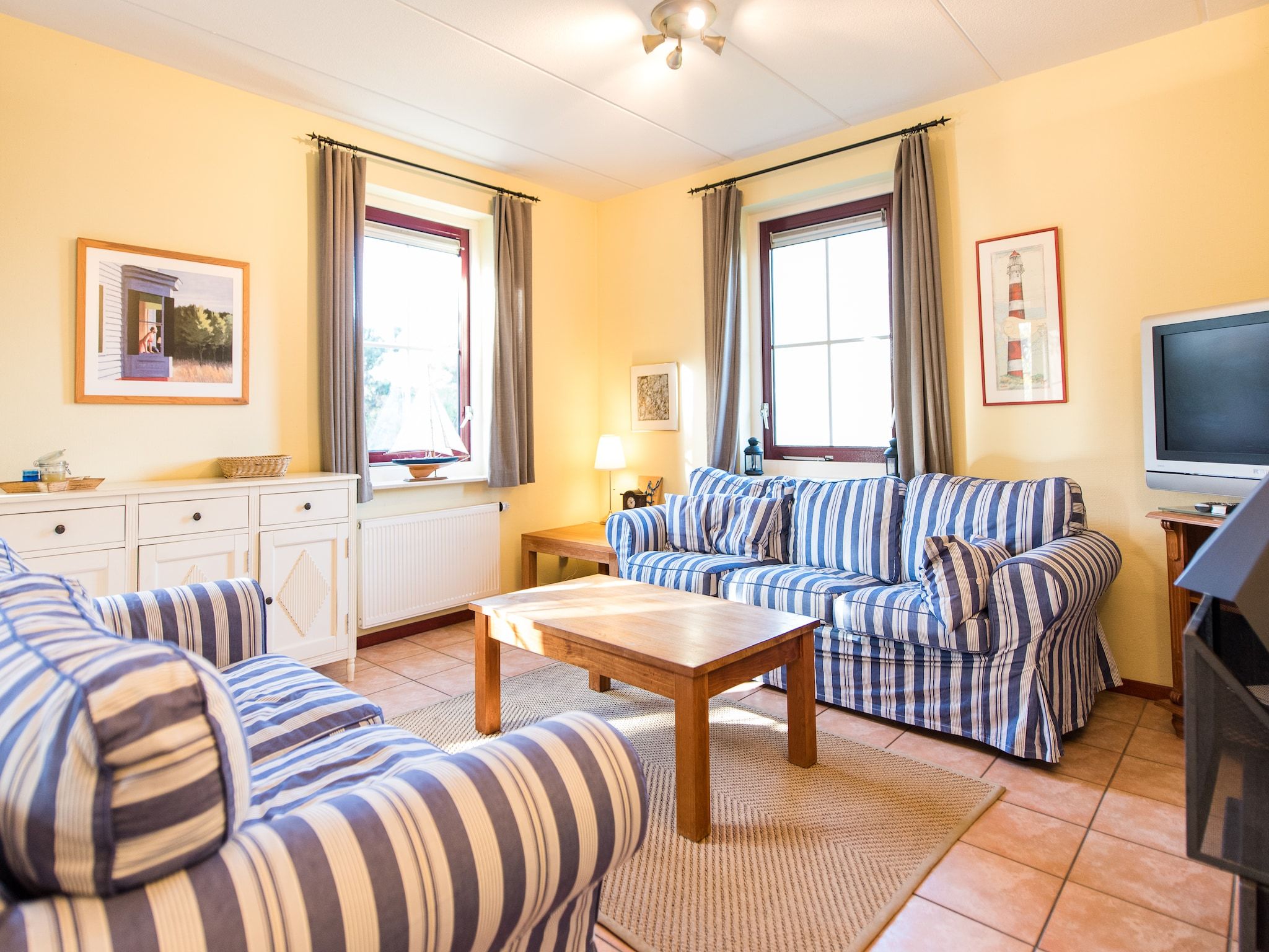 De woonkamer van Vakantiepark Boomhiemke 8 in Hollum