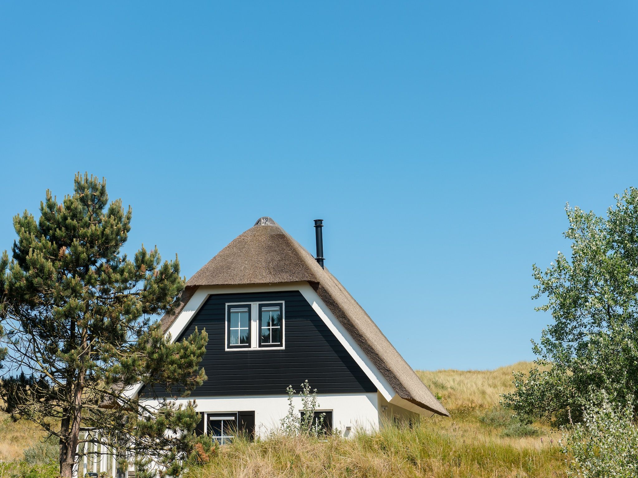 De buitenkant van Vakantiepark Boomhiemke 8 in Hollum