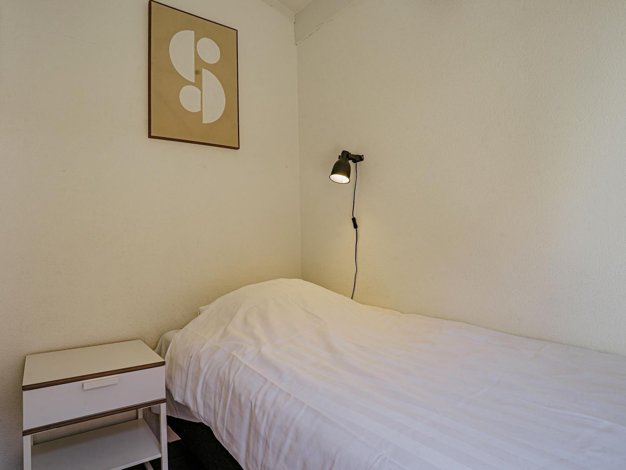 Een slaapkamer van Waterpark de Meerparel 2 in Uitgeest