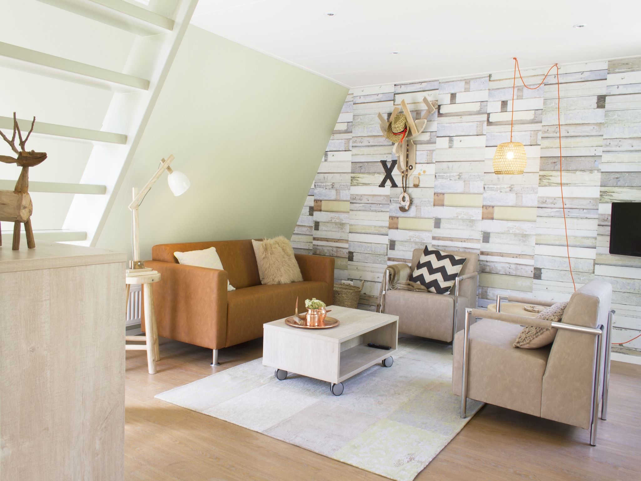 De woonkamer van Bungalowpark Hoenderloo 5 in Hoenderloo