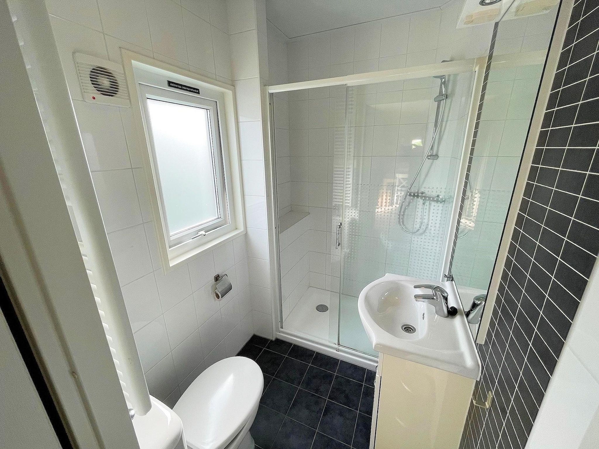 De badkamer van Vakantiepark de Tabaksschuur 2 in Elst