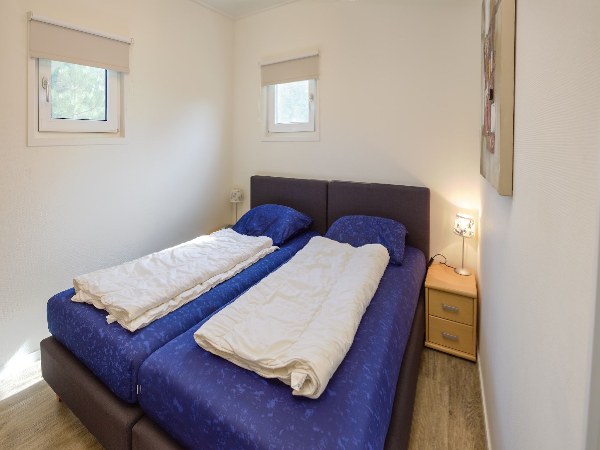 Een slaapkamer van Vakantiepark Boomhiemke 5 in Hollum-Ameland