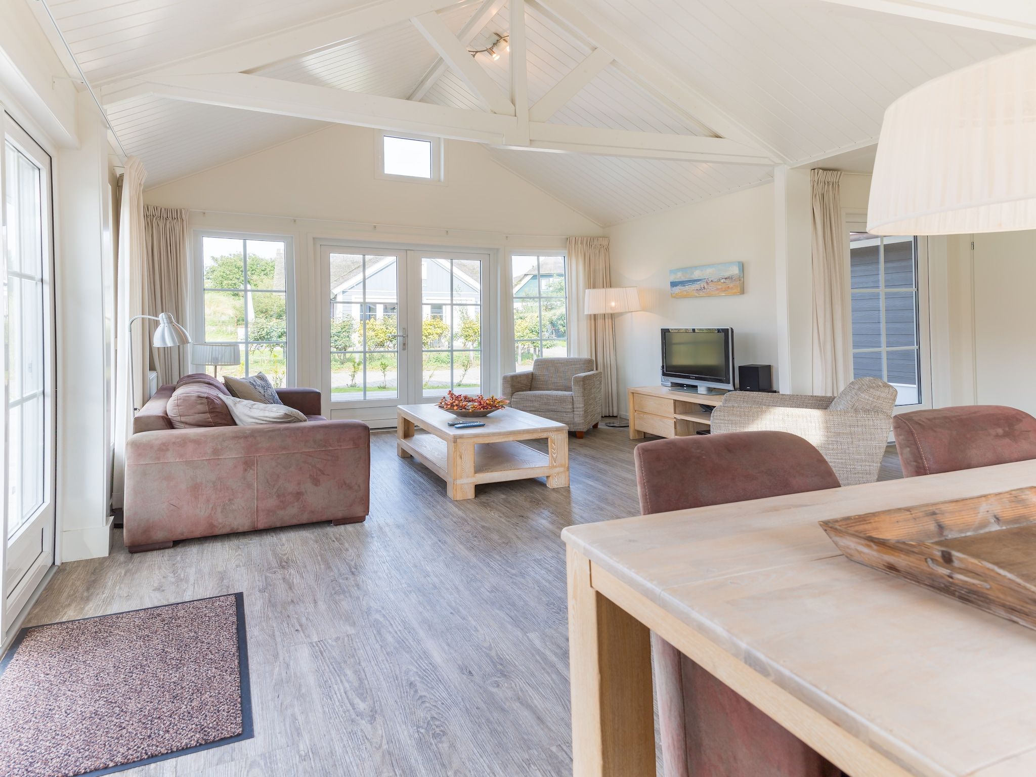 De woonkamer van Vakantiepark Boomhiemke 5 in Hollum-Ameland