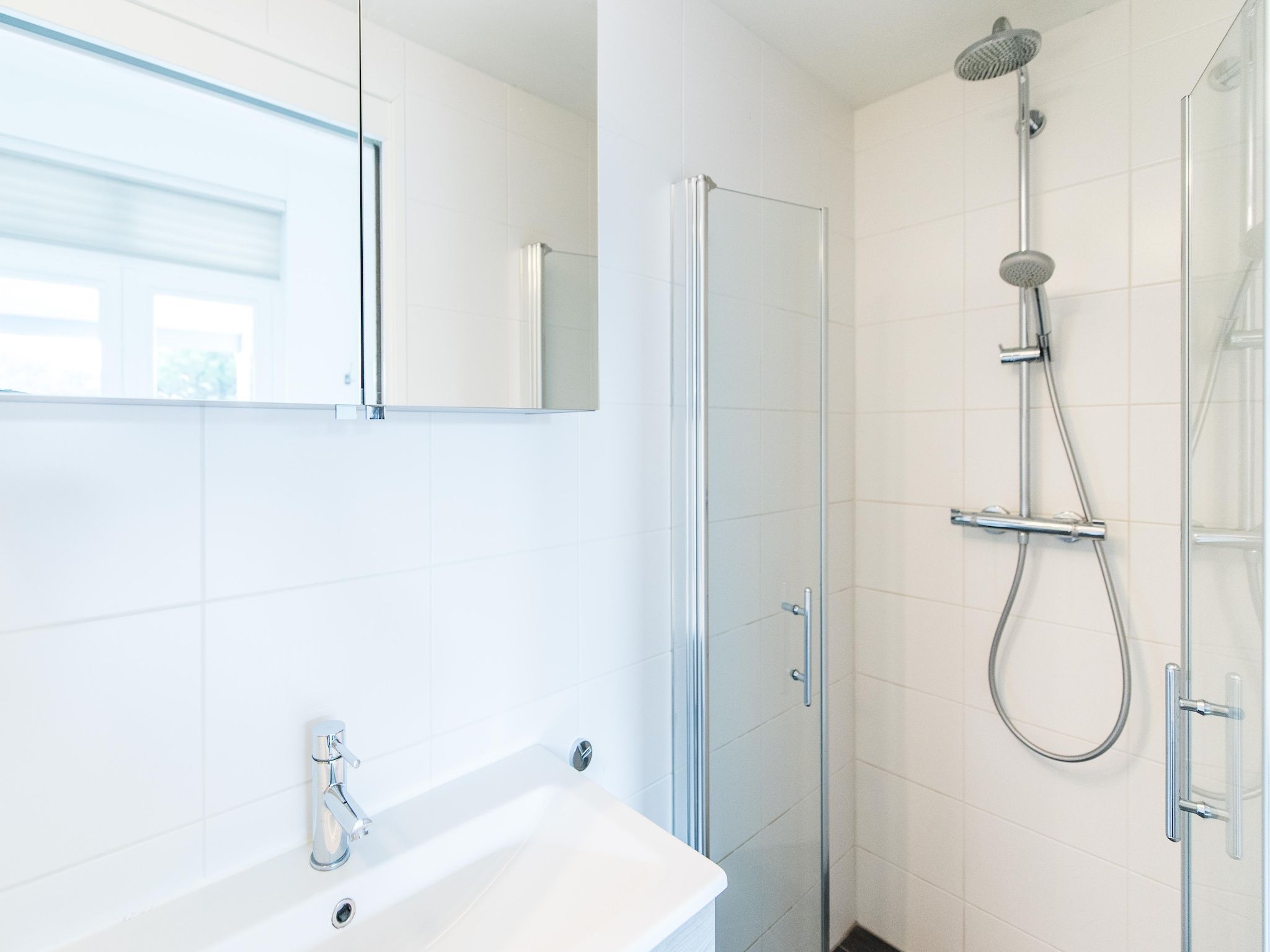 De badkamer van Vakantiepark Boomhiemke 7 in Hollum-Ameland