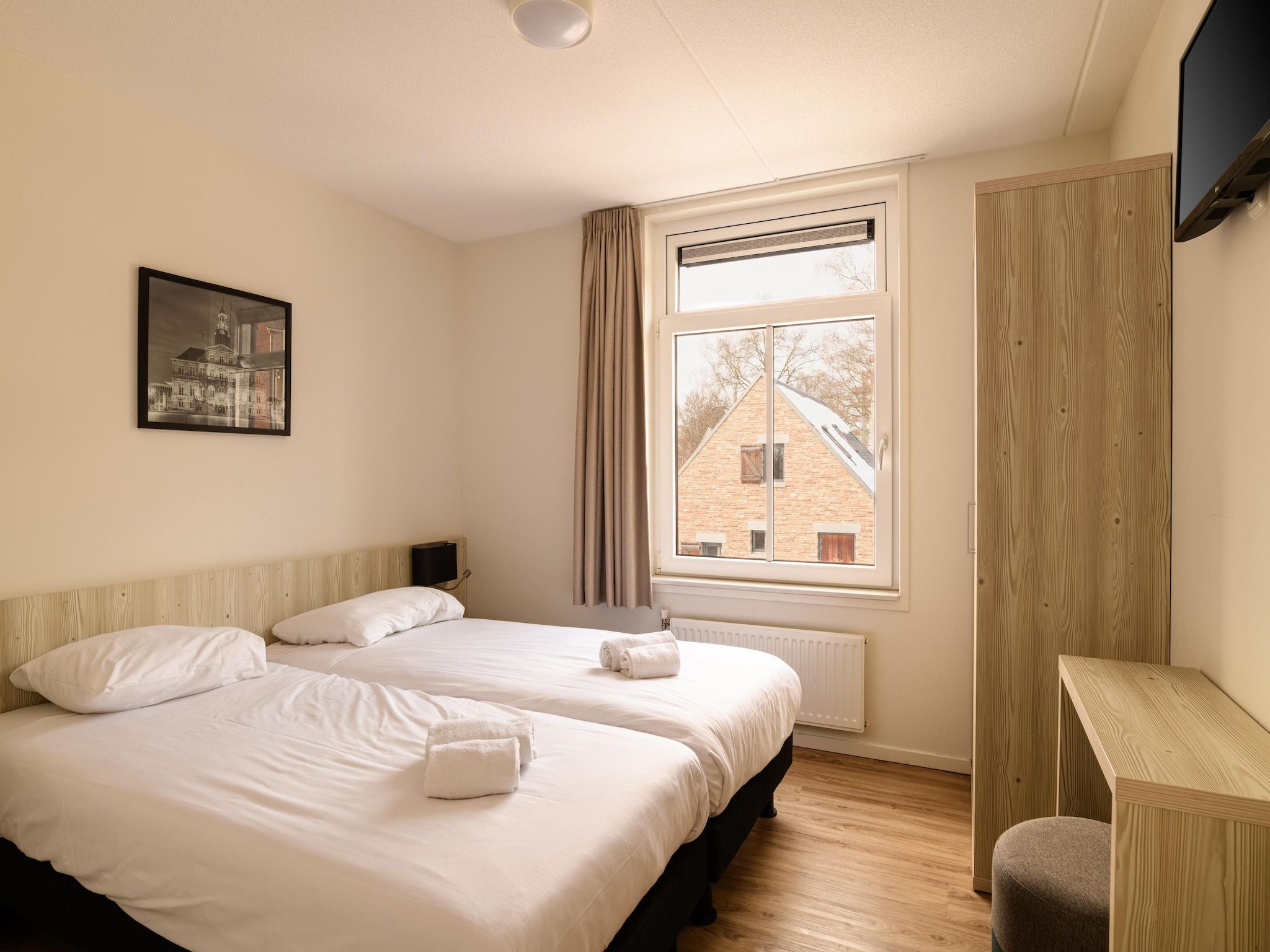 Een slaapkamer van Resort Maastricht 4 in Maastricht