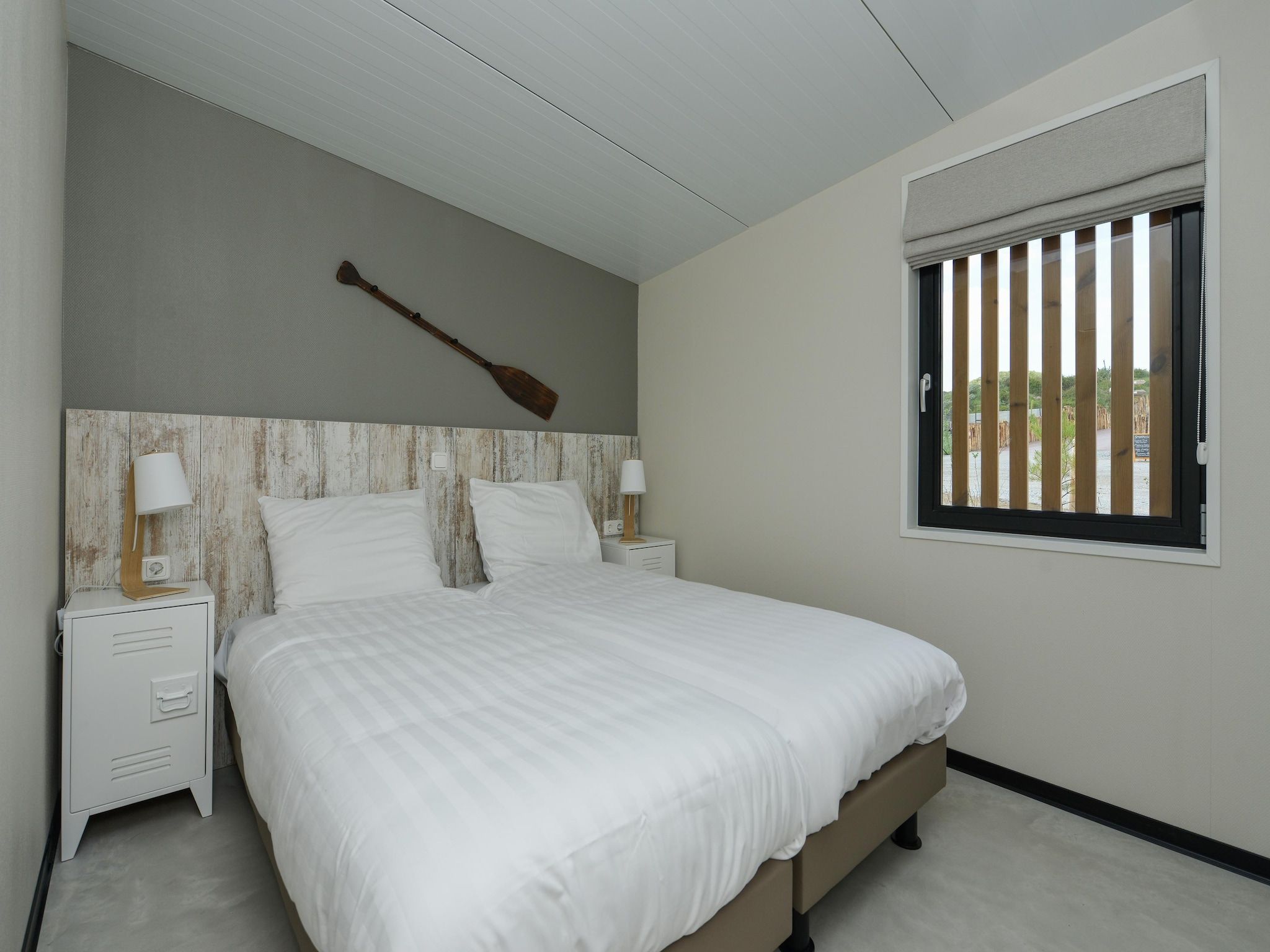 Een slaapkamer van Sea Lodges Bloemendaal 1 in Bloemendaal