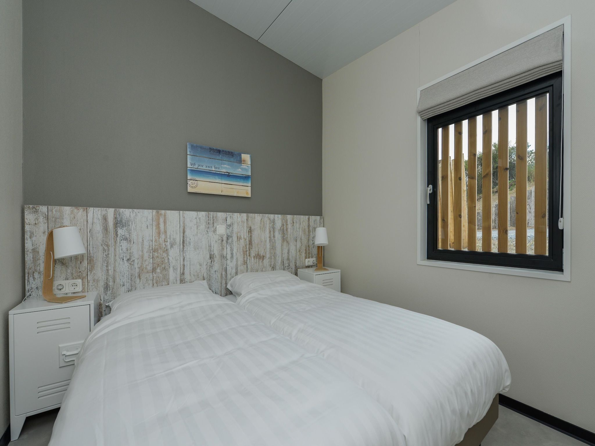 Een slaapkamer van Sea Lodges Bloemendaal 1 in Bloemendaal