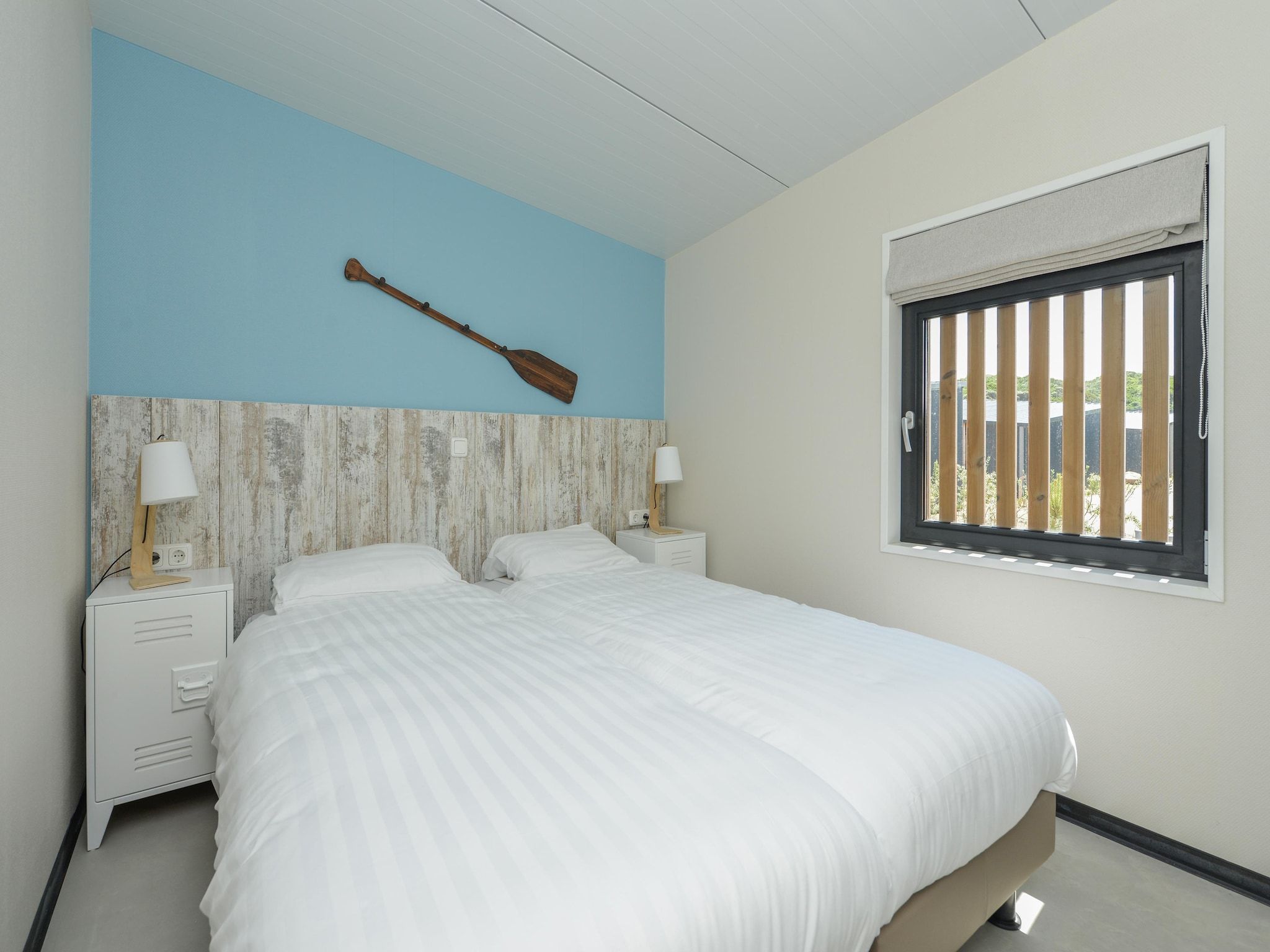 Een slaapkamer van Sea Lodges Bloemendaal 5 in Bloemendaal