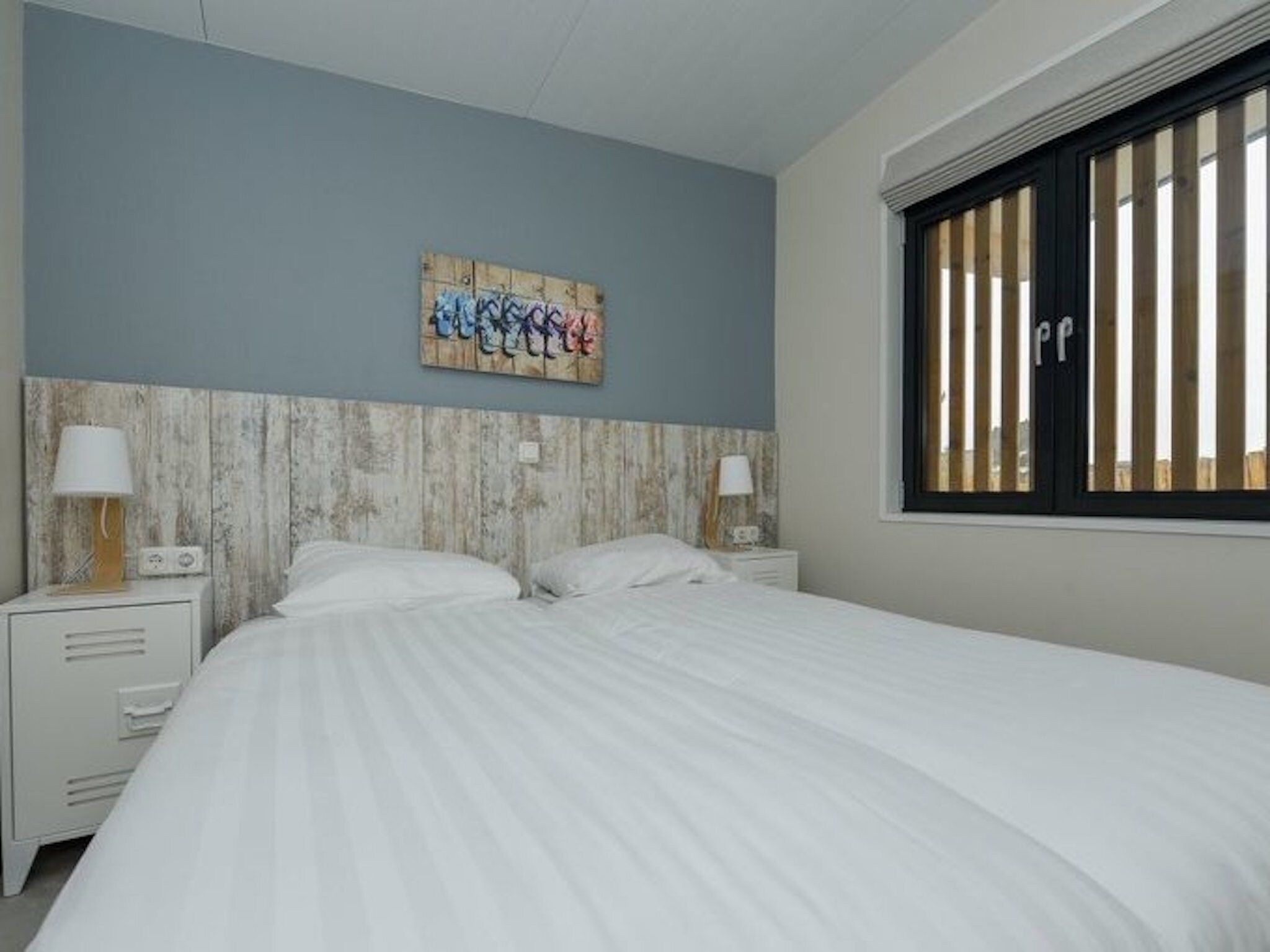 Een slaapkamer van Sea Lodges Bloemendaal 3 in Bloemendaal