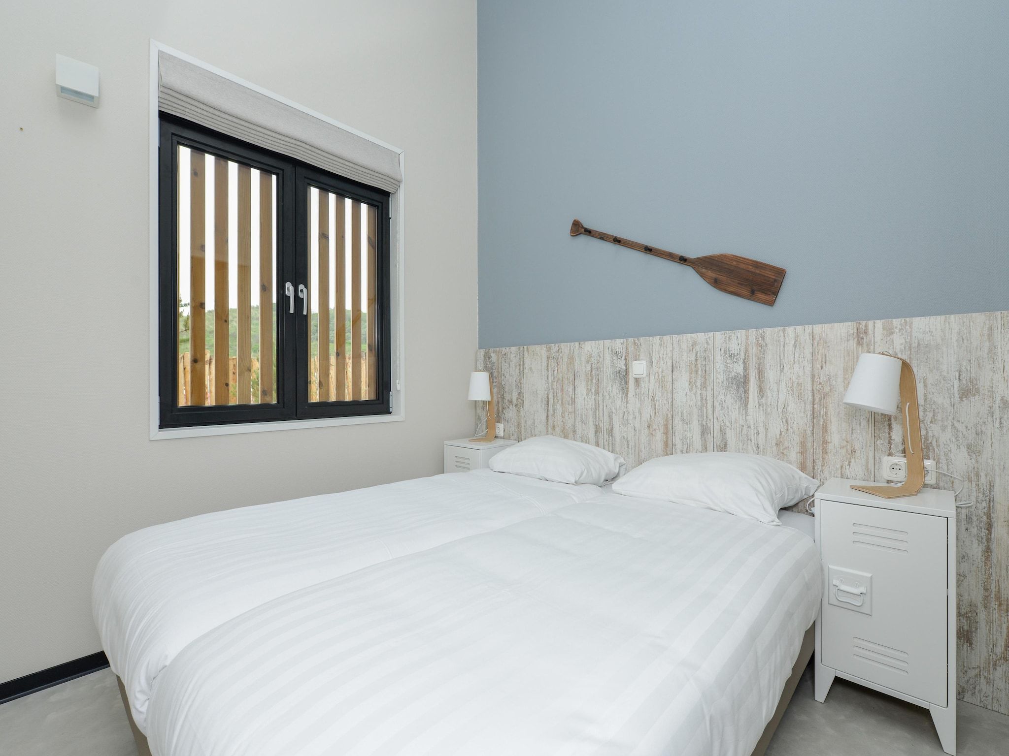 Een slaapkamer van Sea Lodges Bloemendaal 3 in Bloemendaal