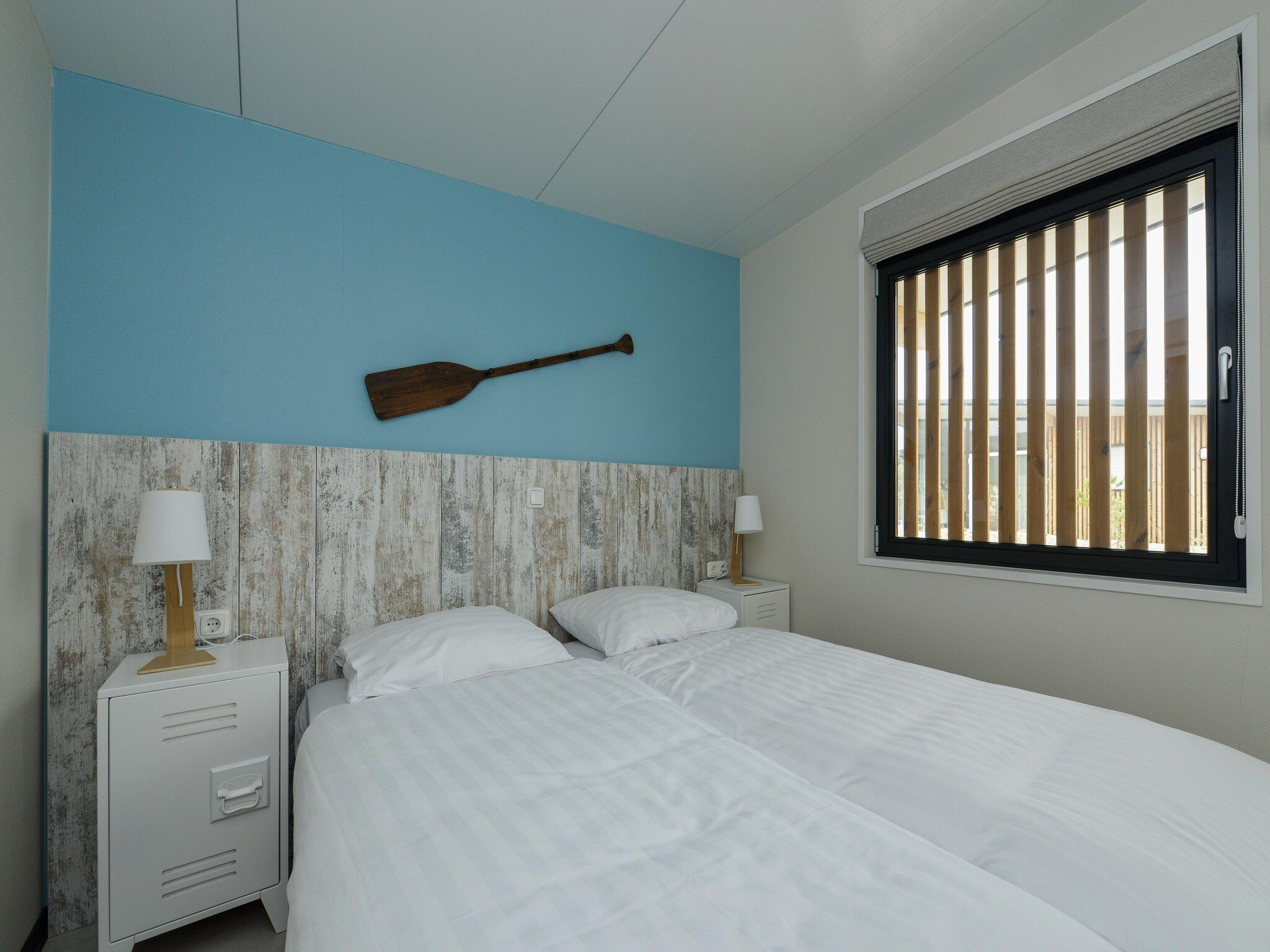 Een slaapkamer van Sea Lodges Bloemendaal 4 in Bloemendaal