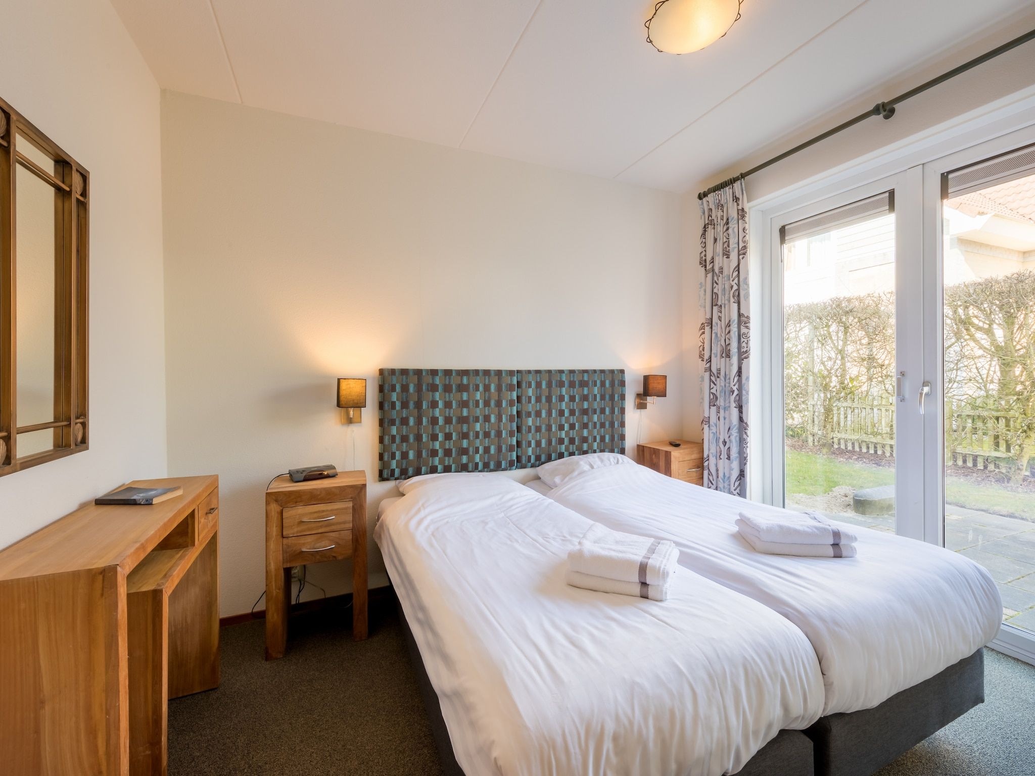 Een slaapkamer van Noordzee Résidence De Banjaard 9 in Kamperland