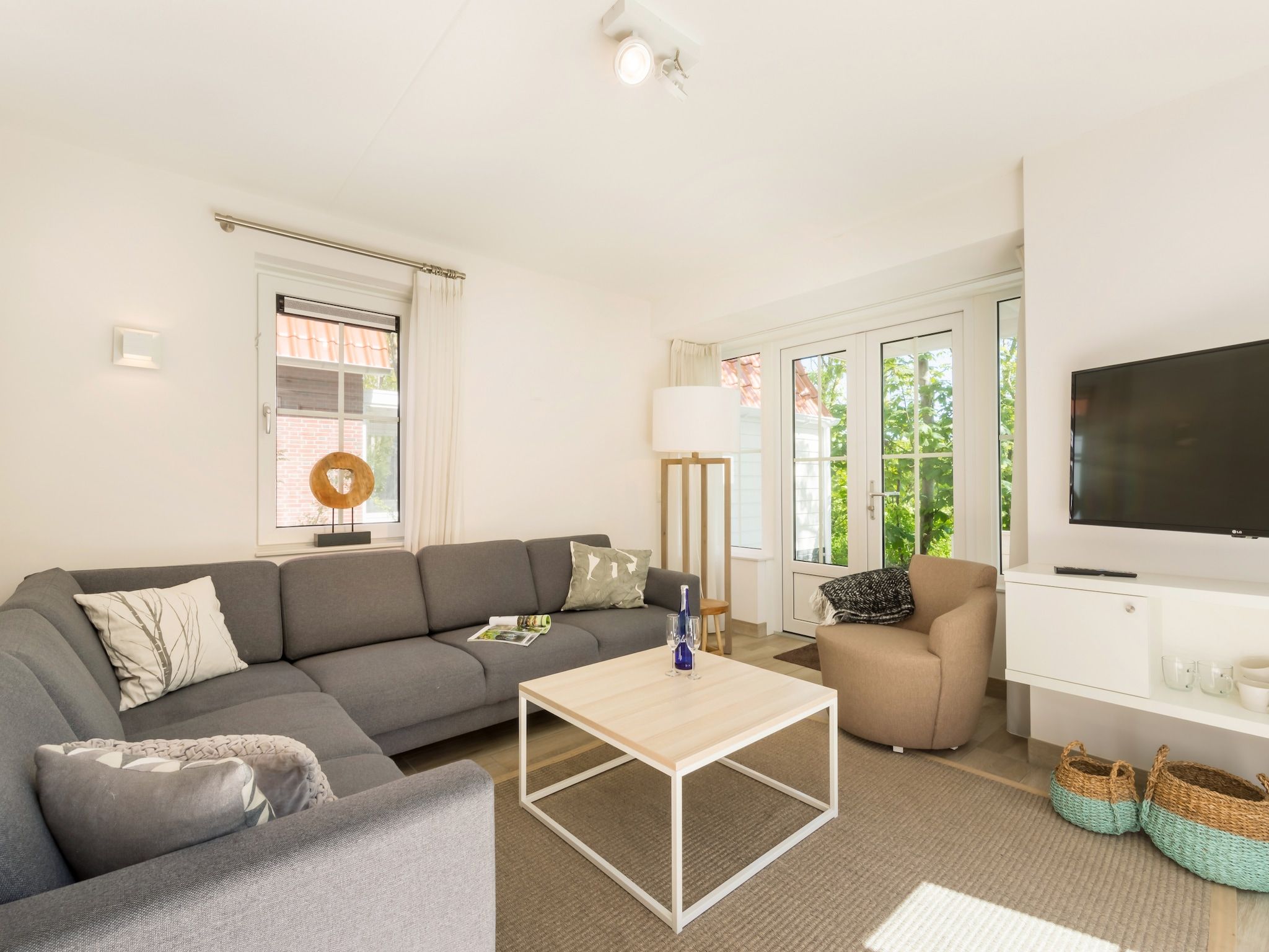 De woonkamer van Noordzee Résidence Dishoek 2 in Koudekerke