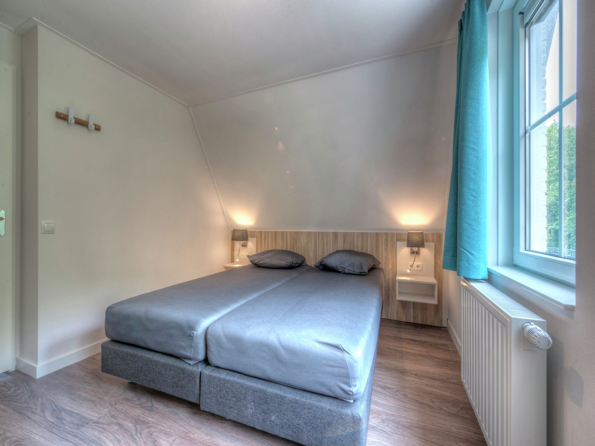 Een slaapkamer van Noordzee Résidence Dishoek 9 in Koudekerke