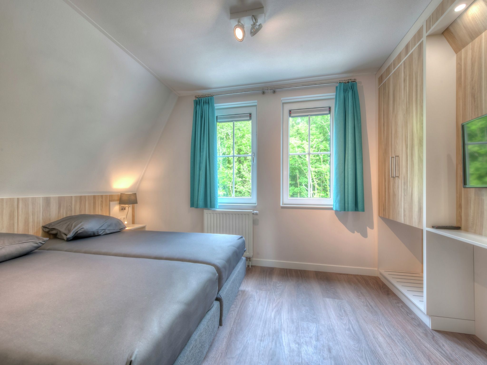 Een slaapkamer van Noordzee Résidence Dishoek 9 in Koudekerke