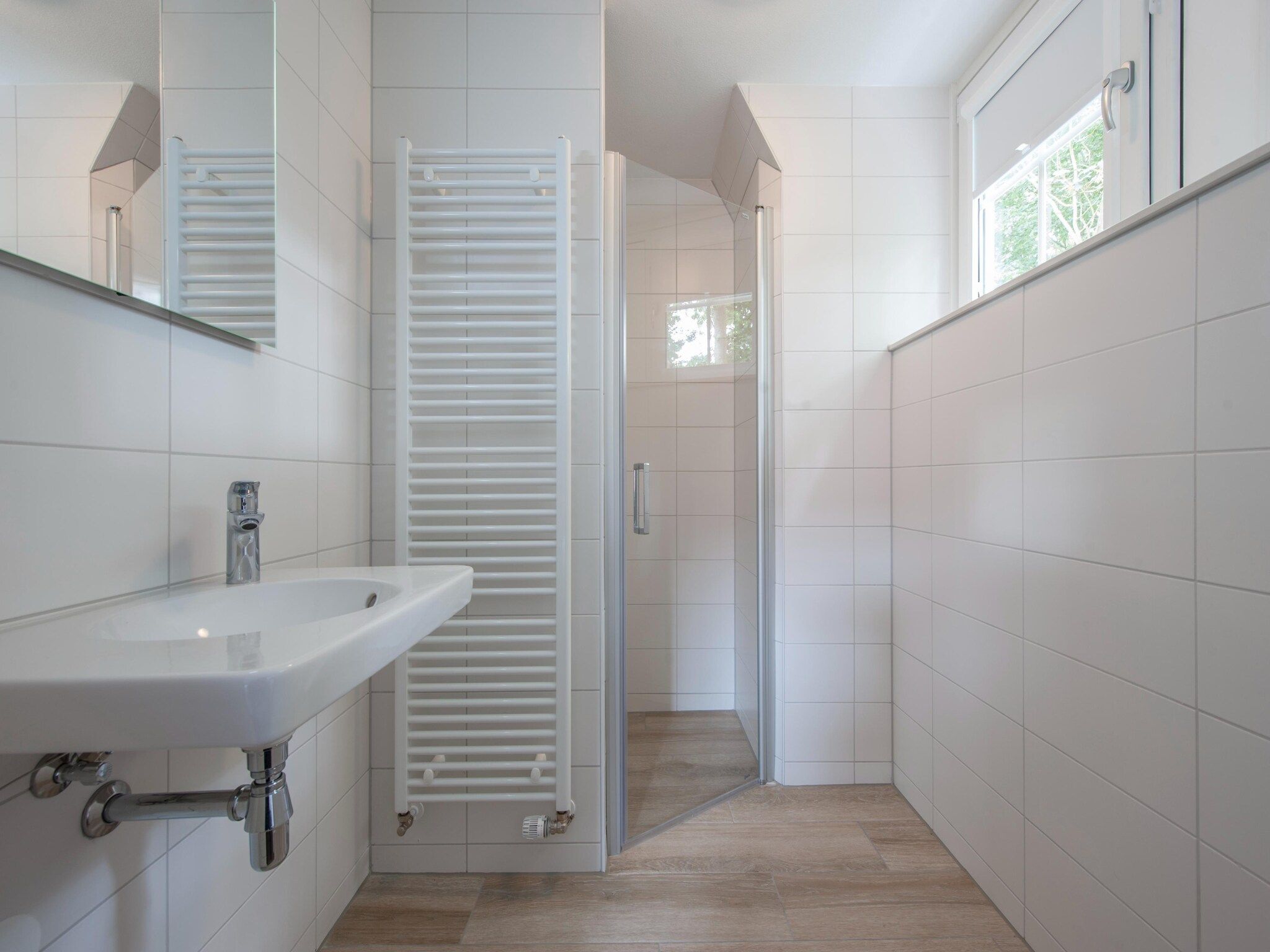 De badkamer van Noordzee Résidence Dishoek 8 in Koudekerke