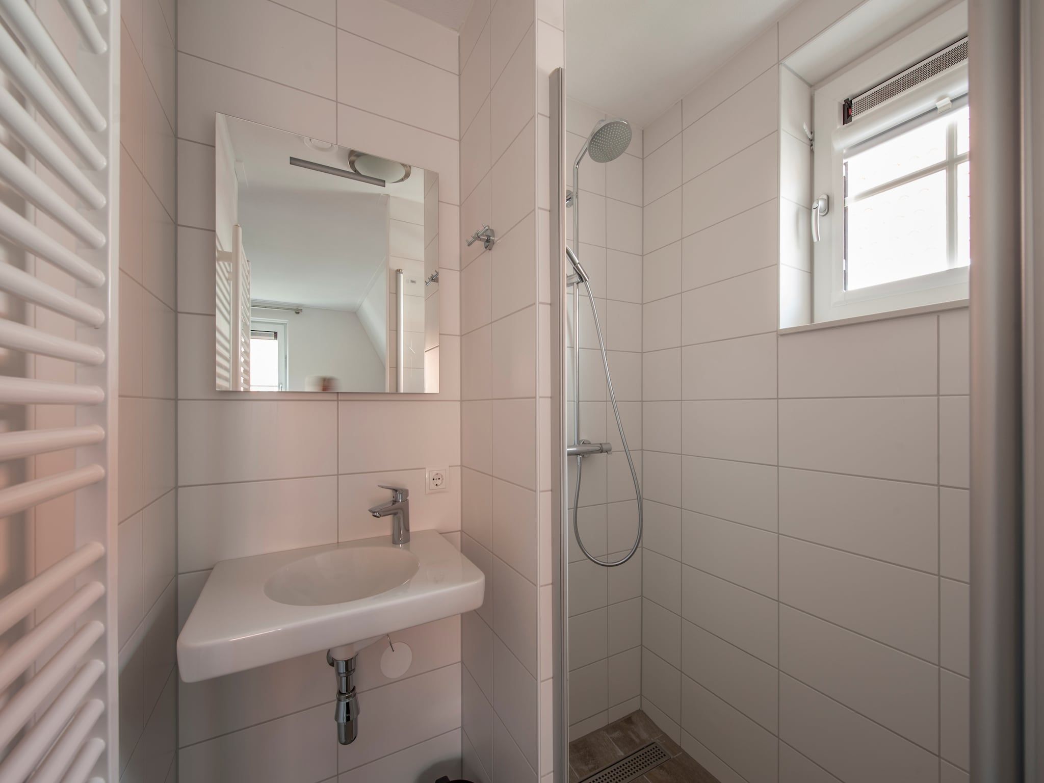 De badkamer van Noordzee Résidence Dishoek 3 in Koudekerke