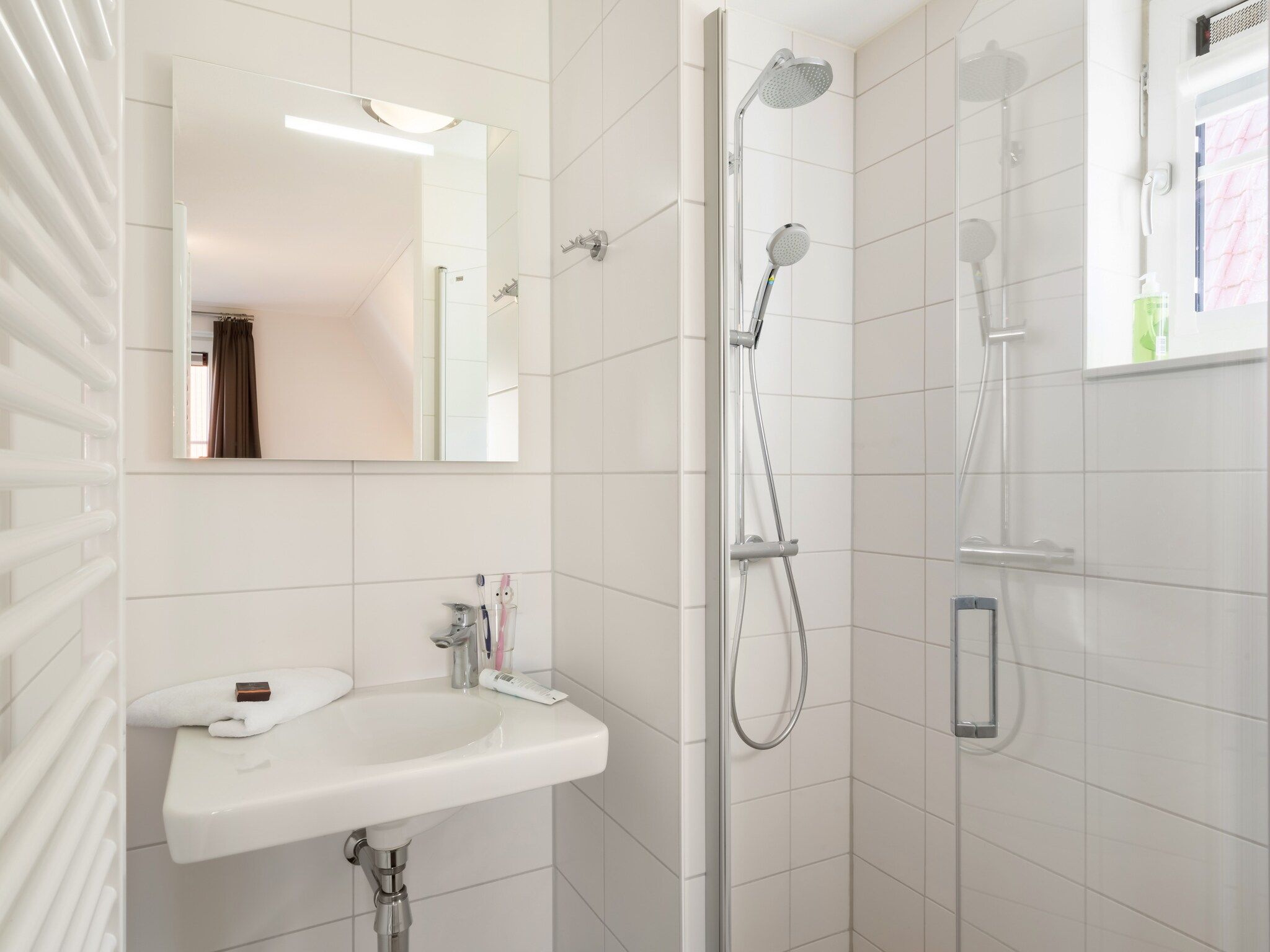 De badkamer van Noordzee Résidence Dishoek 3 in Koudekerke