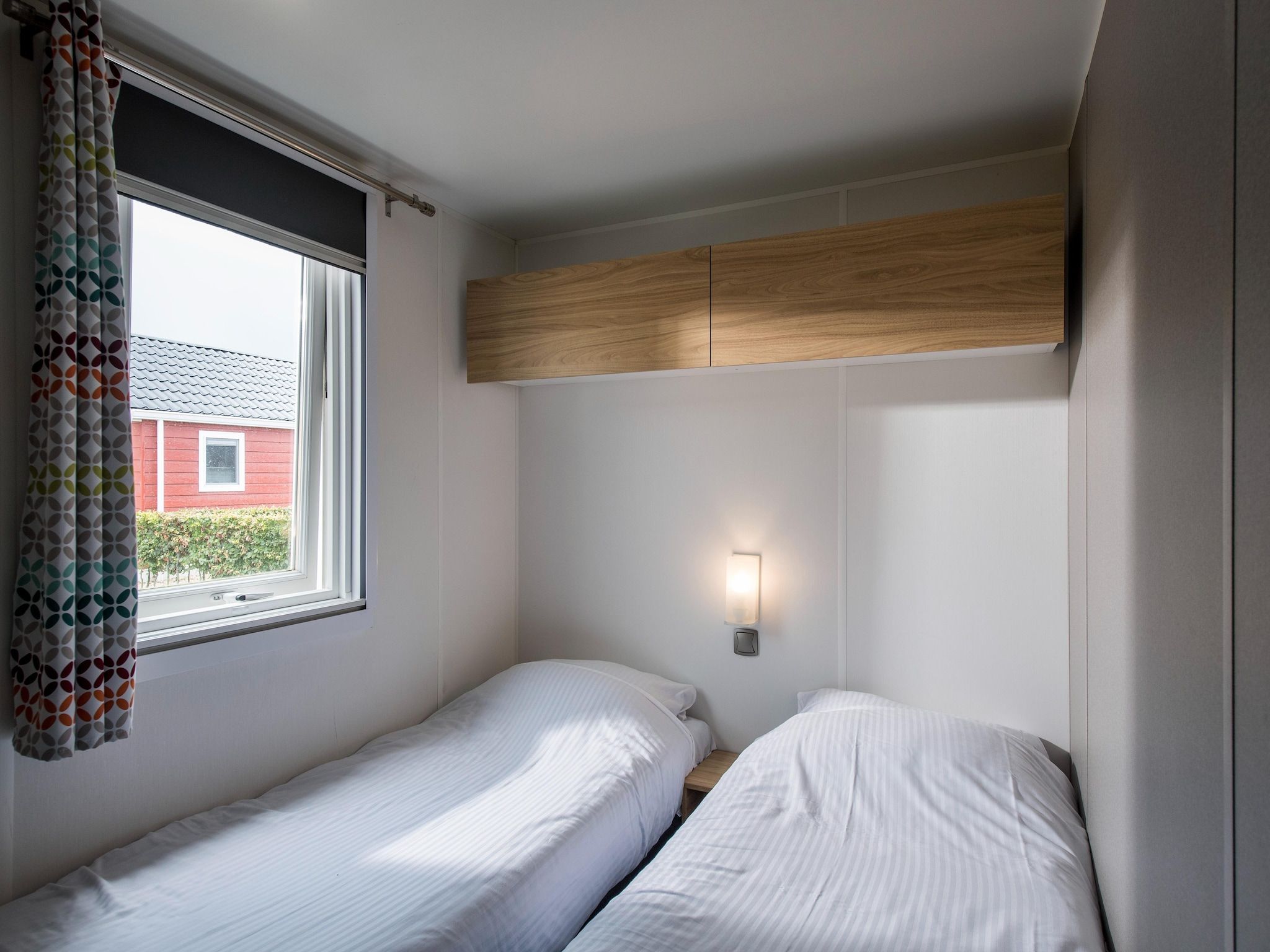 Een slaapkamer van Vakantiepark Eiland van Maurik 2 in Maurik