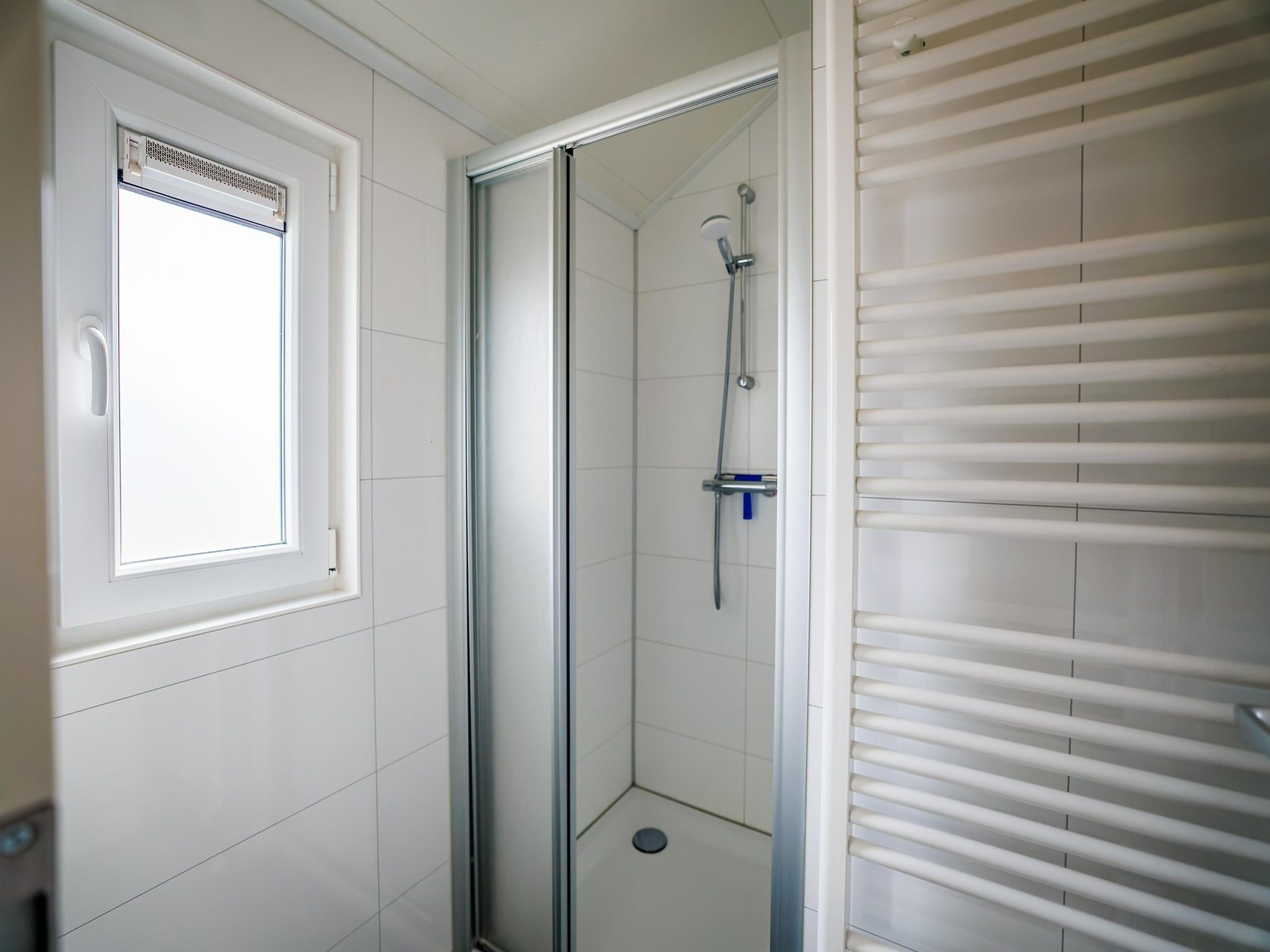 De badkamer van Vakantiepark Eiland van Maurik 2 in Maurik