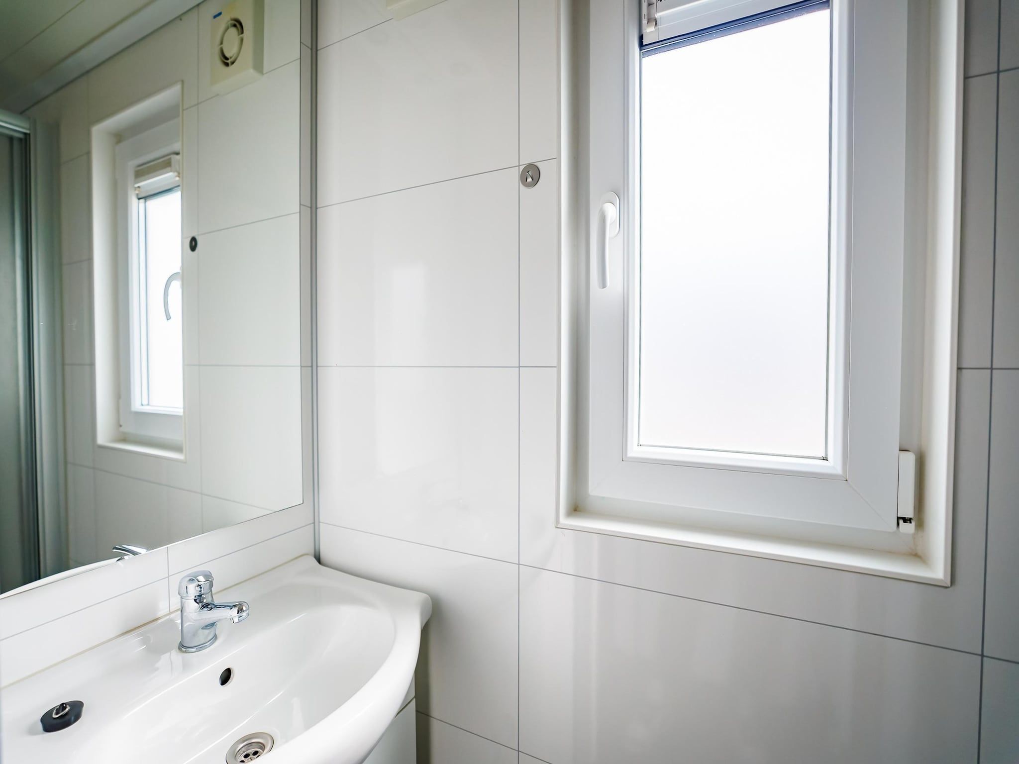 De badkamer van Vakantiepark Eiland van Maurik 2 in Maurik