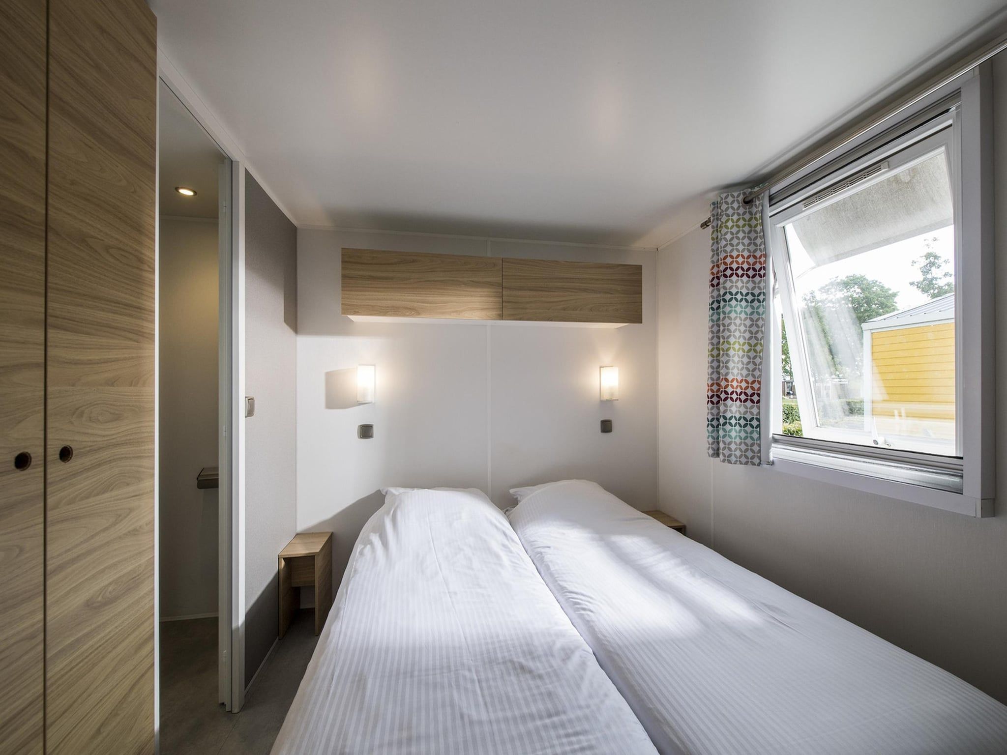 Een slaapkamer van Vakantiepark Eiland van Maurik 3 in Maurik