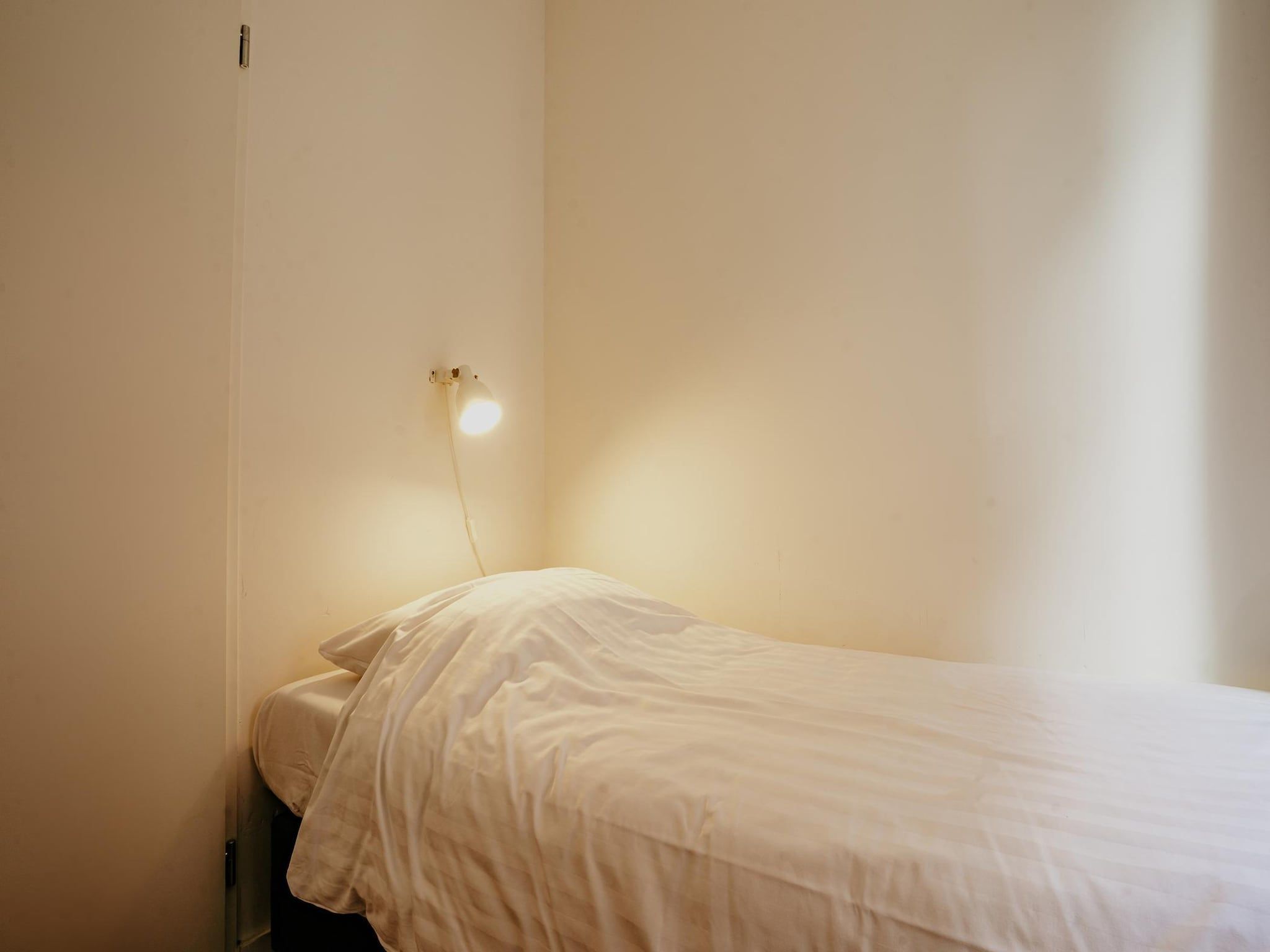 Een slaapkamer van Waterpark de Meerparel  1 in Uitgeest