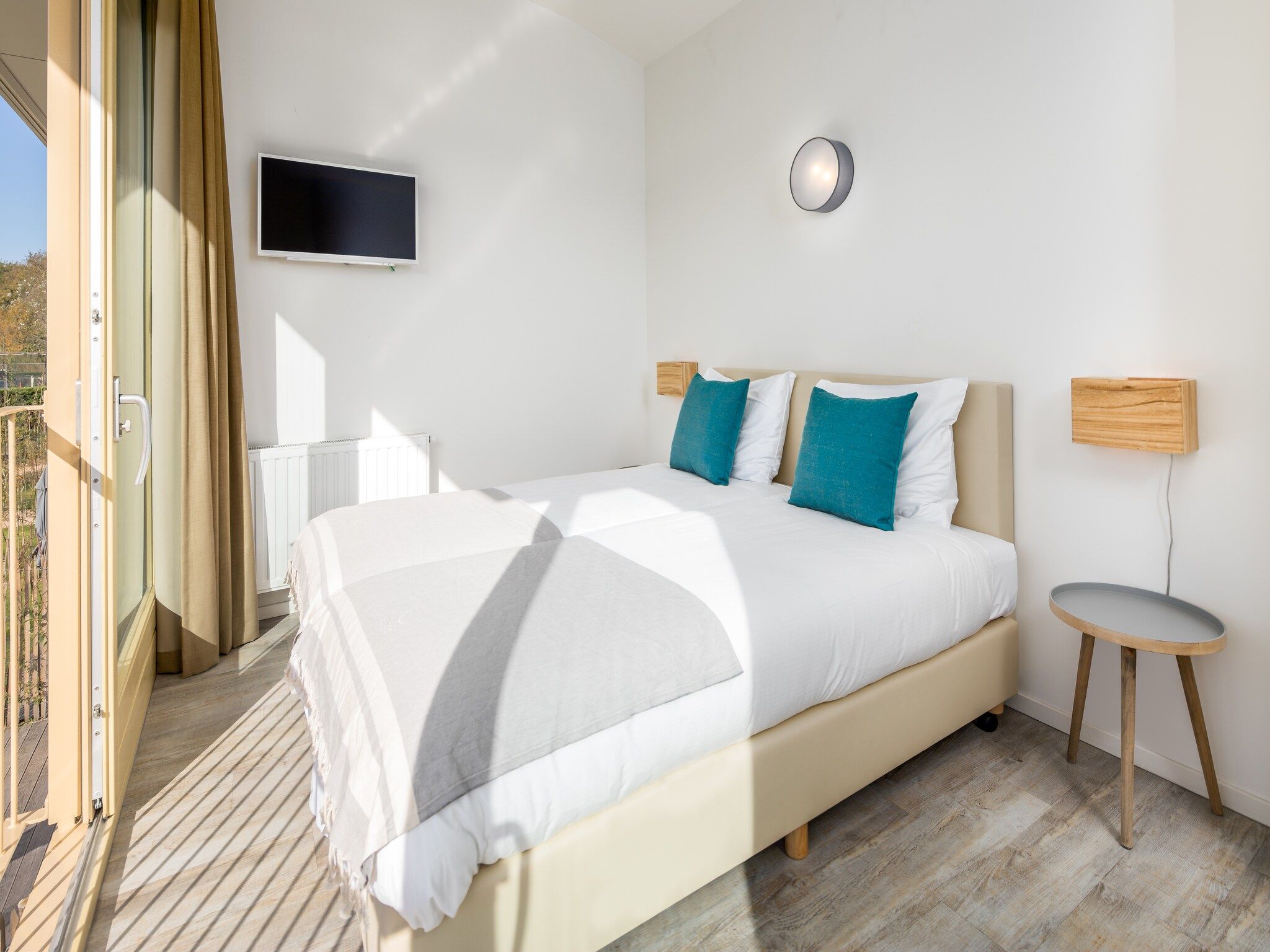 Een slaapkamer van Noordzee Resort Vlissingen 1 in Vlissingen