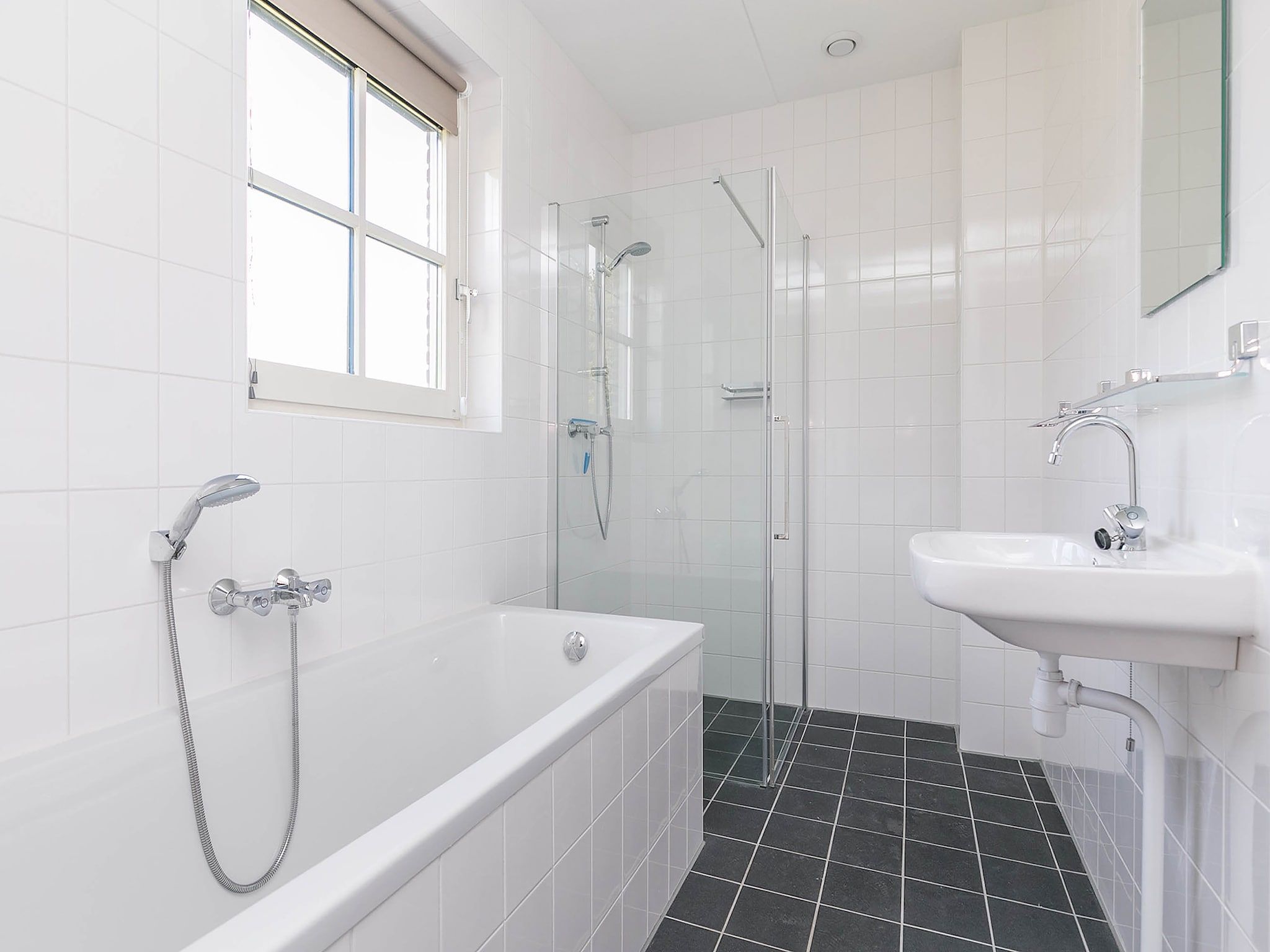 De badkamer van Villaparc Schoonhovenseland in Hollandscheveld