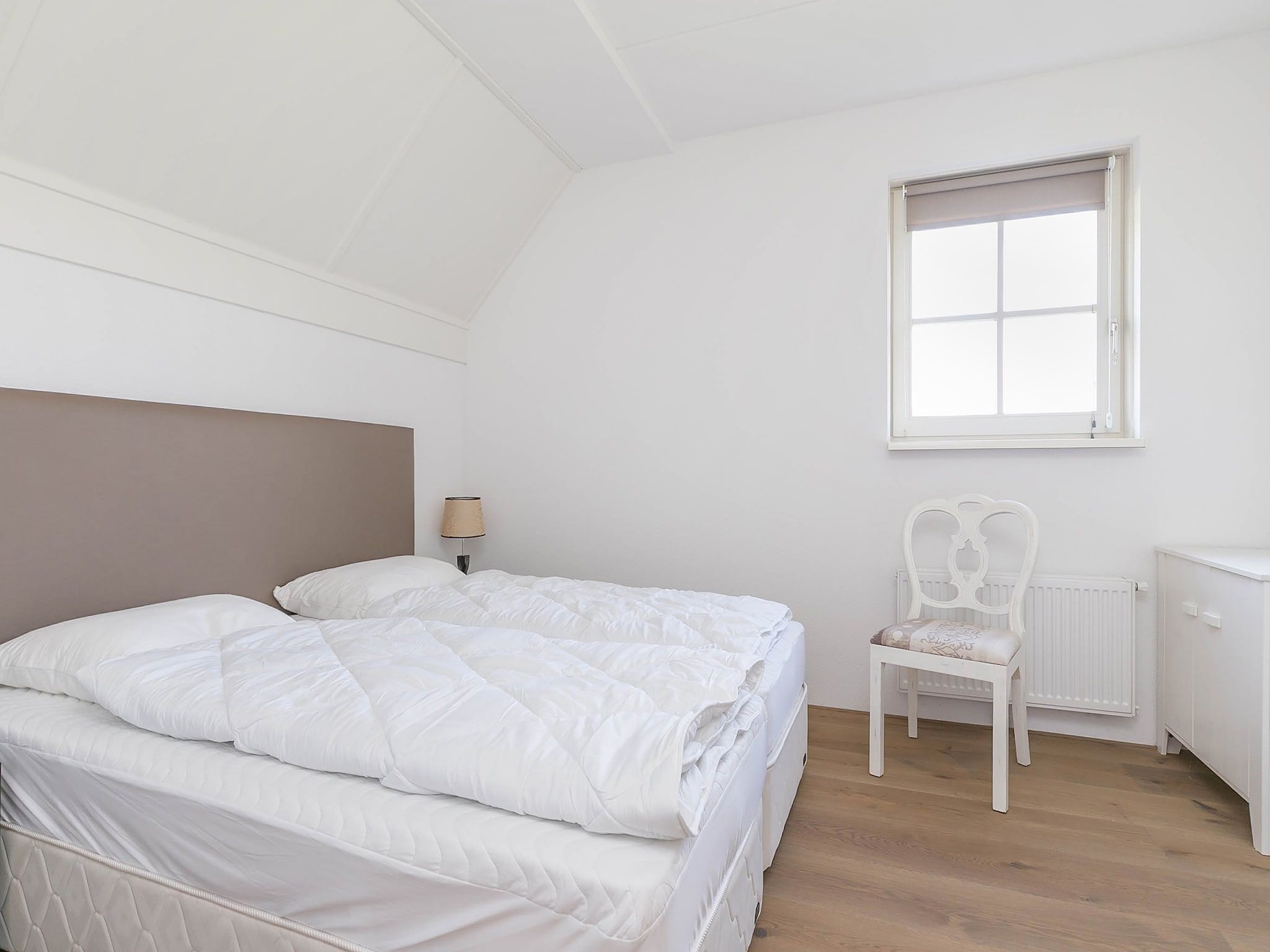 Een slaapkamer van Villaparc Schoonhovenseland in Hollandscheveld