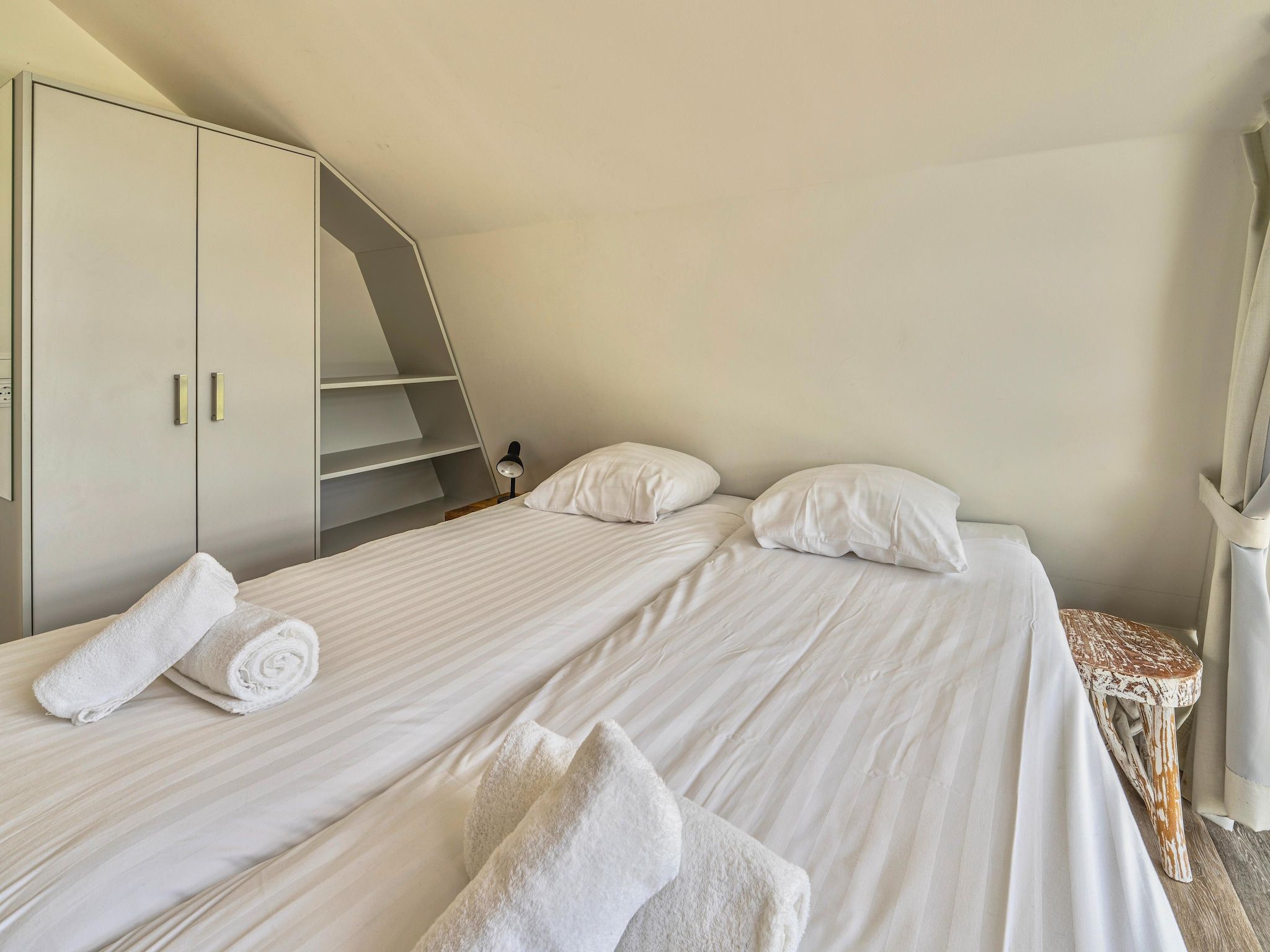 Een slaapkamer van Villa Egmond in Egmond aan den Hoef