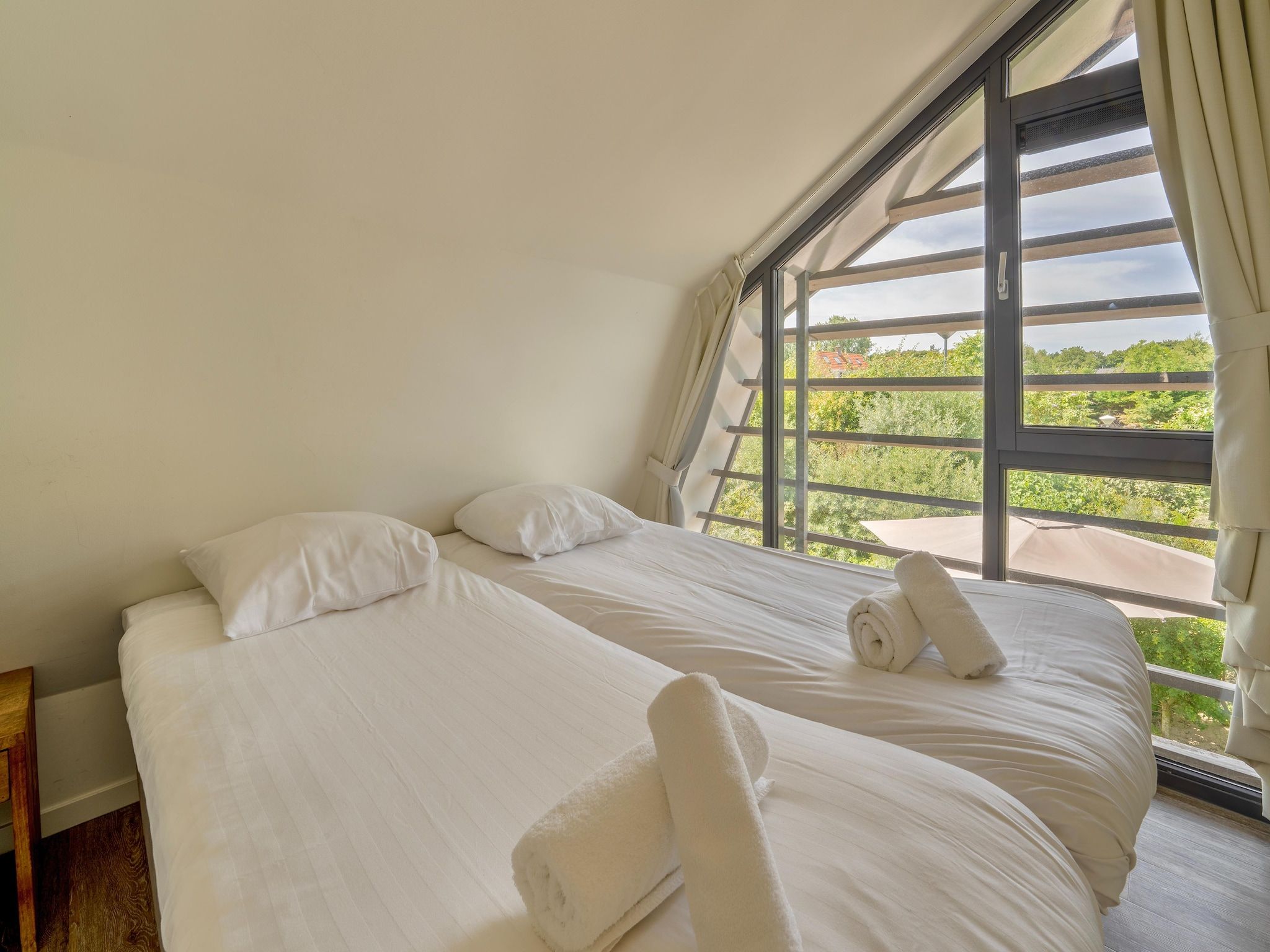 Een slaapkamer van Villa Egmond in Egmond aan den Hoef