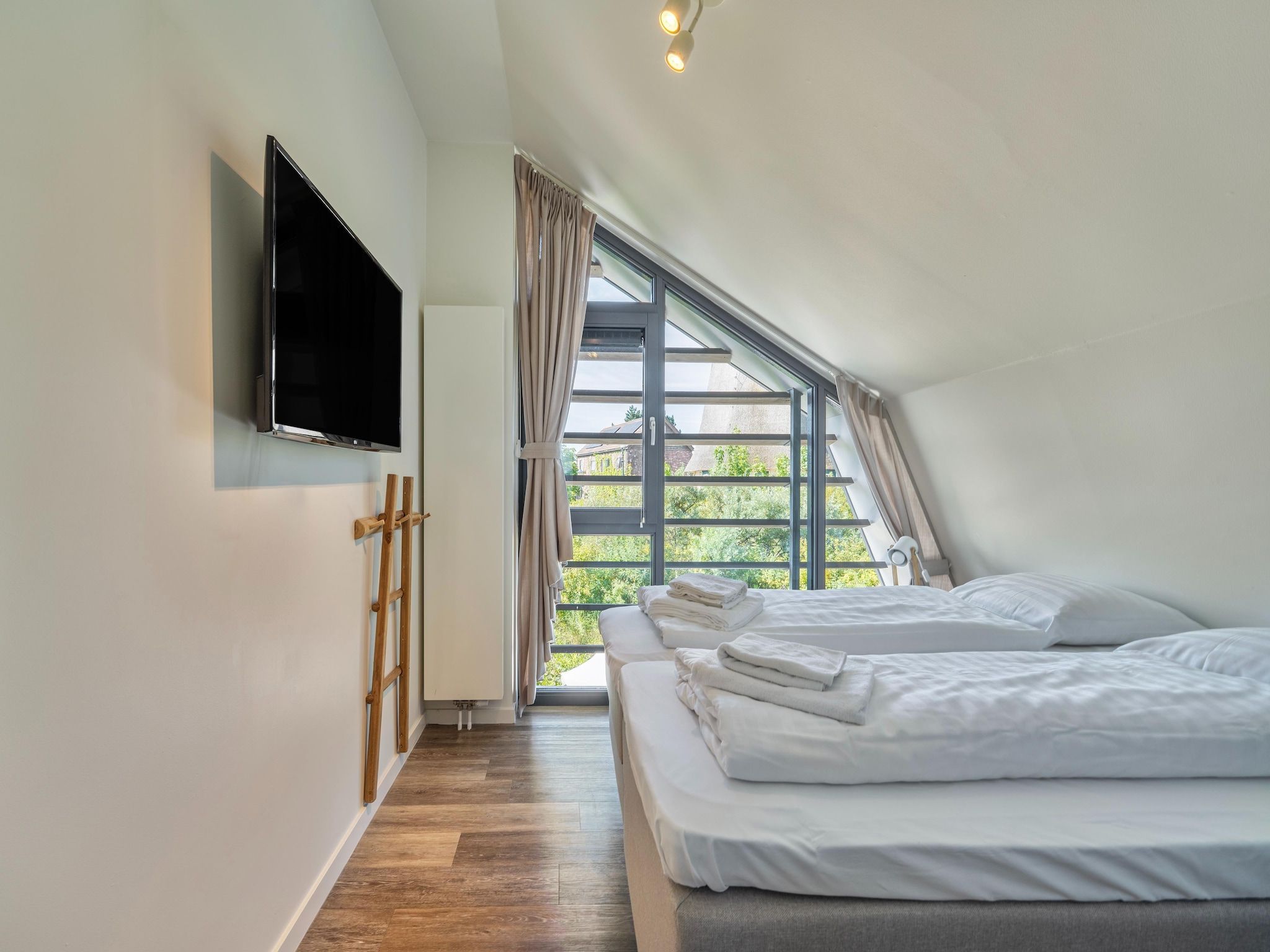 Een slaapkamer van Casa Anti Stressa in Egmond aan den Hoef