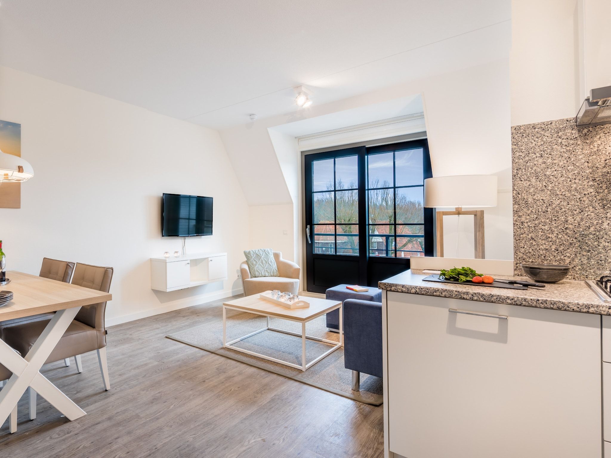 De woonkamer van Noordzee Résidence Dishoek 6 in Koudekerke