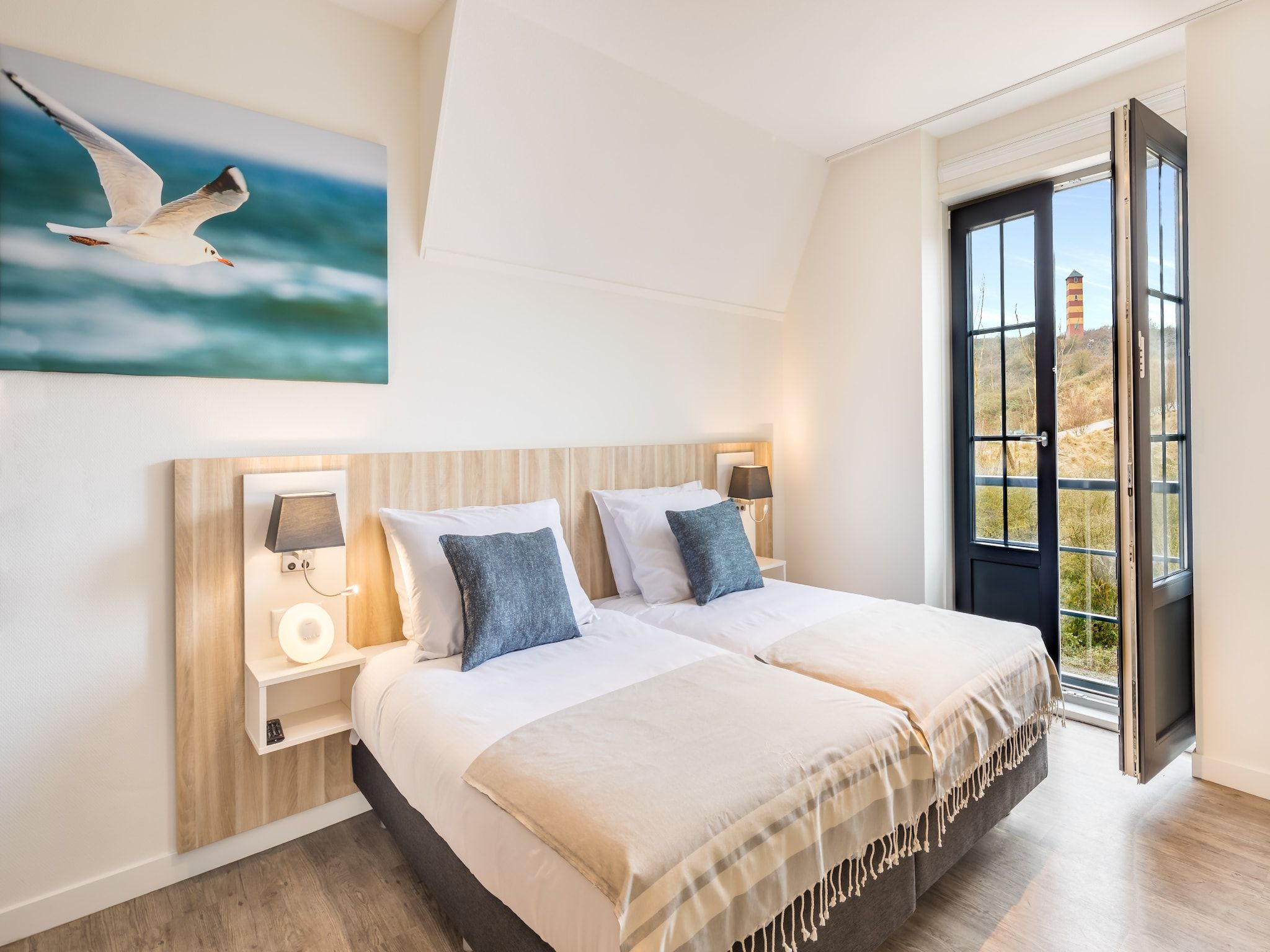 Een slaapkamer van Noordzee Résidence Dishoek 5 in Koudekerke