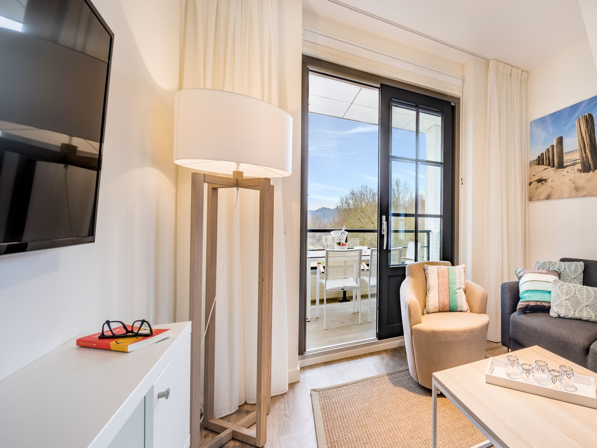 De woonkamer van Noordzee Résidence Dishoek 5 in Koudekerke