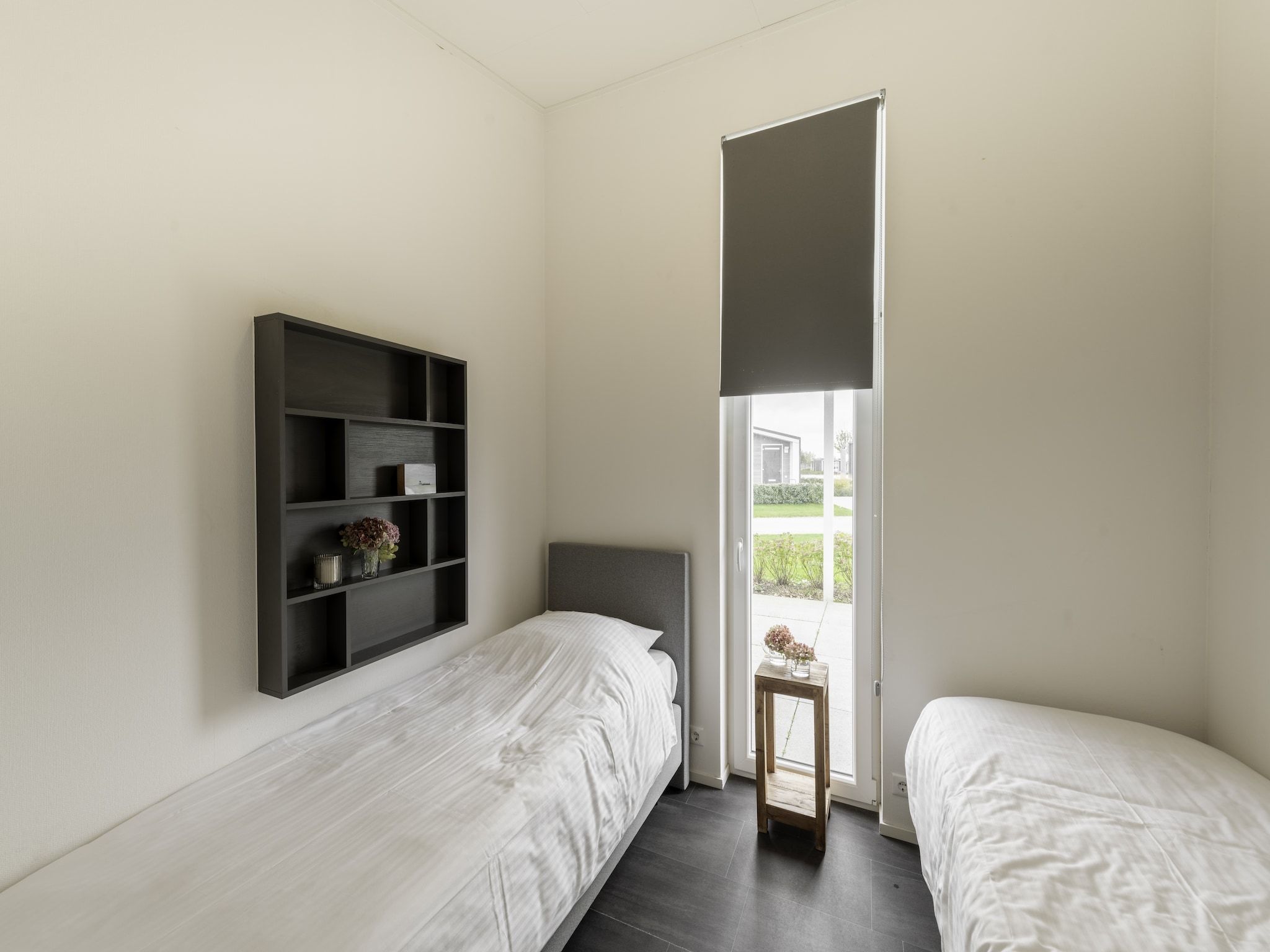 Een slaapkamer van Water Resort Oosterschelde 91 in Wemeldinge