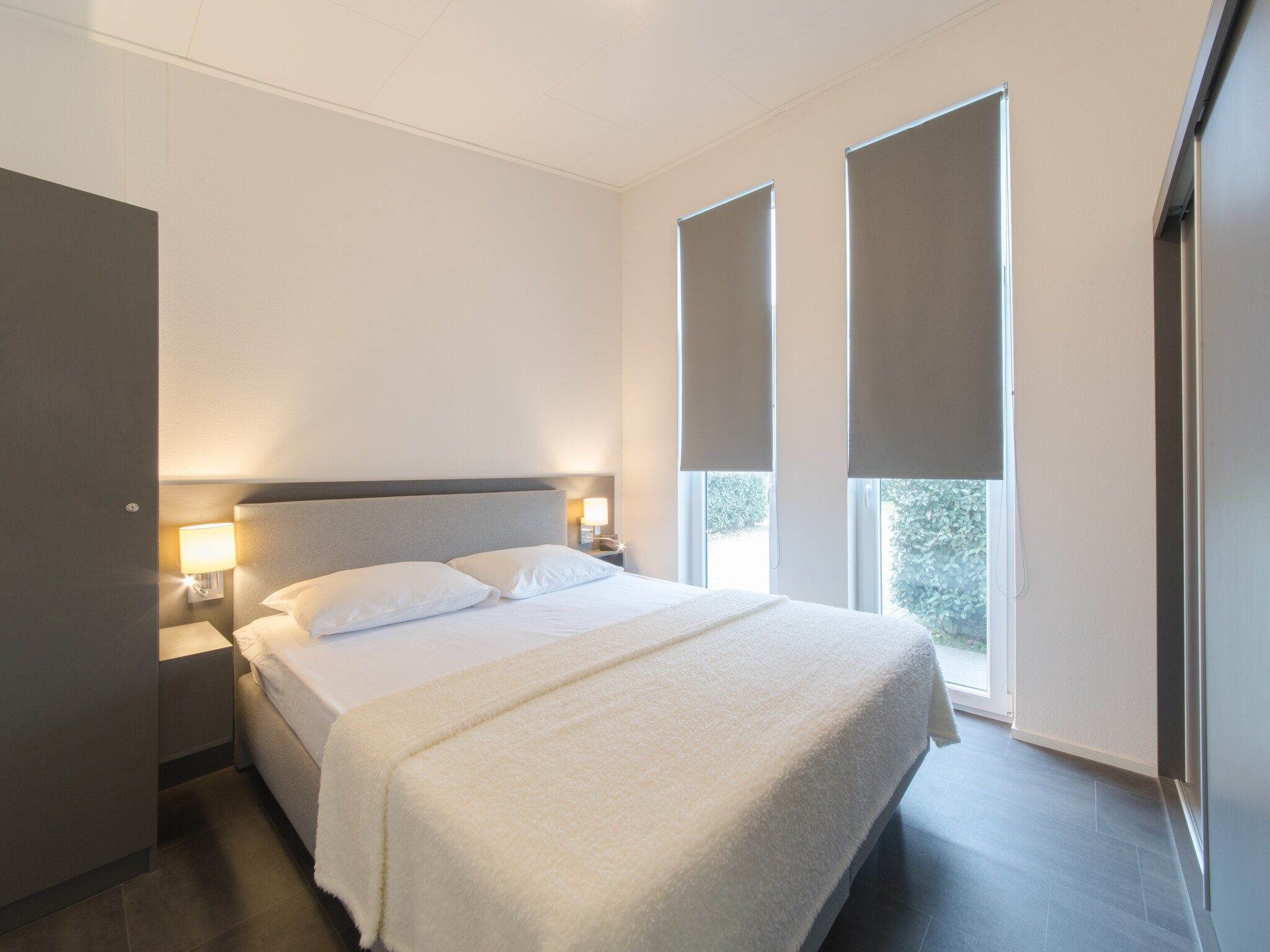 Een slaapkamer van Water Resort Oosterschelde 91 in Wemeldinge