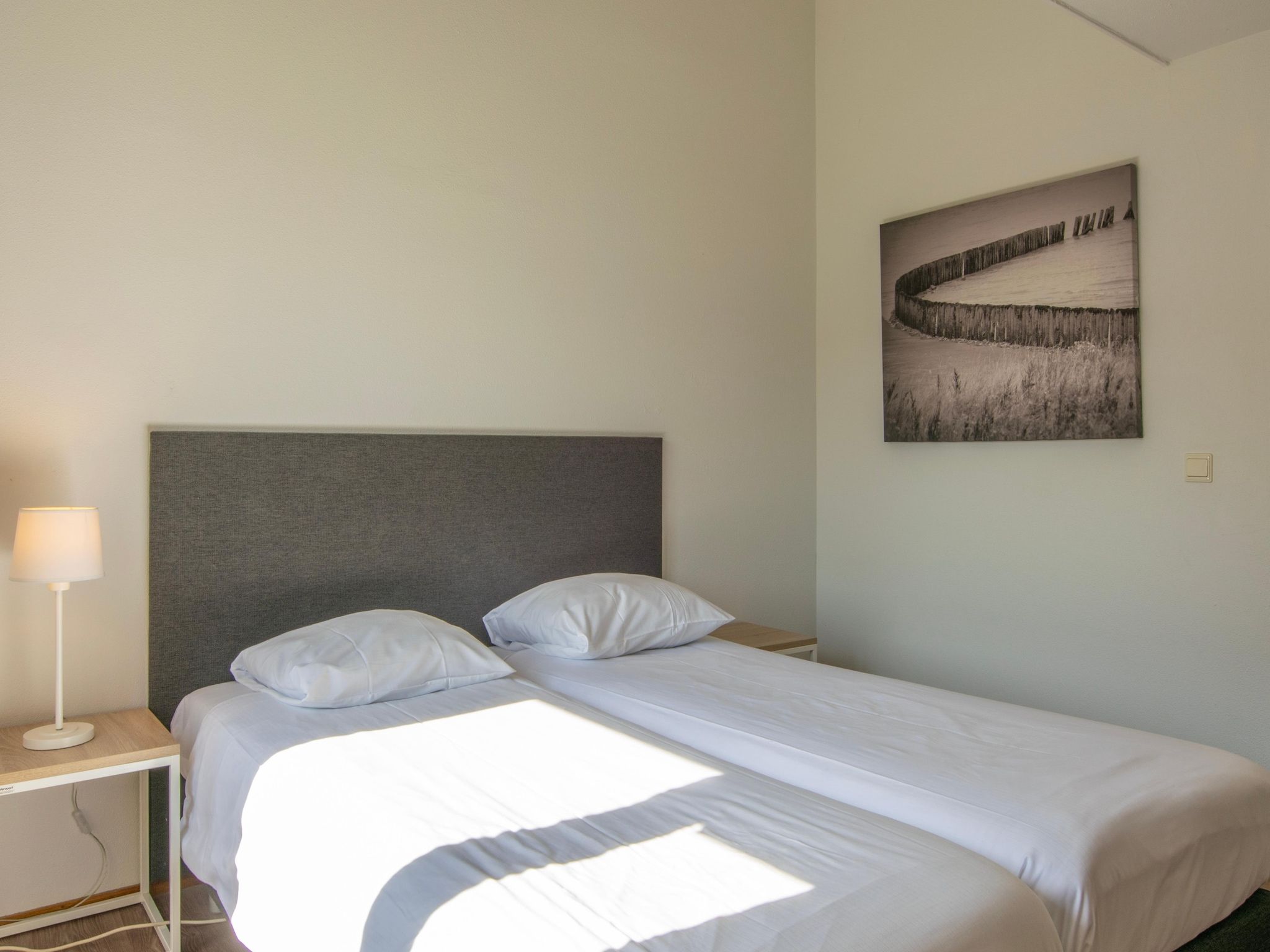 Een slaapkamer van Vakantiepark Hof Domburg 10 in Domburg