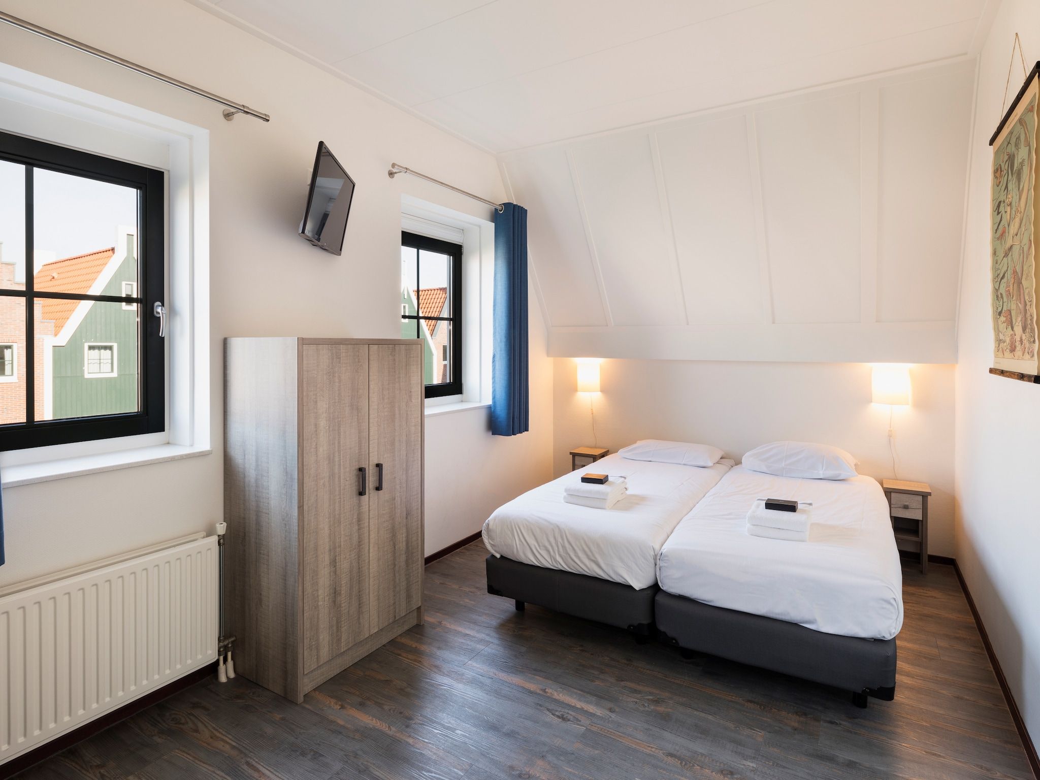 Een slaapkamer van Marinapark Volendam 4 in Volendam